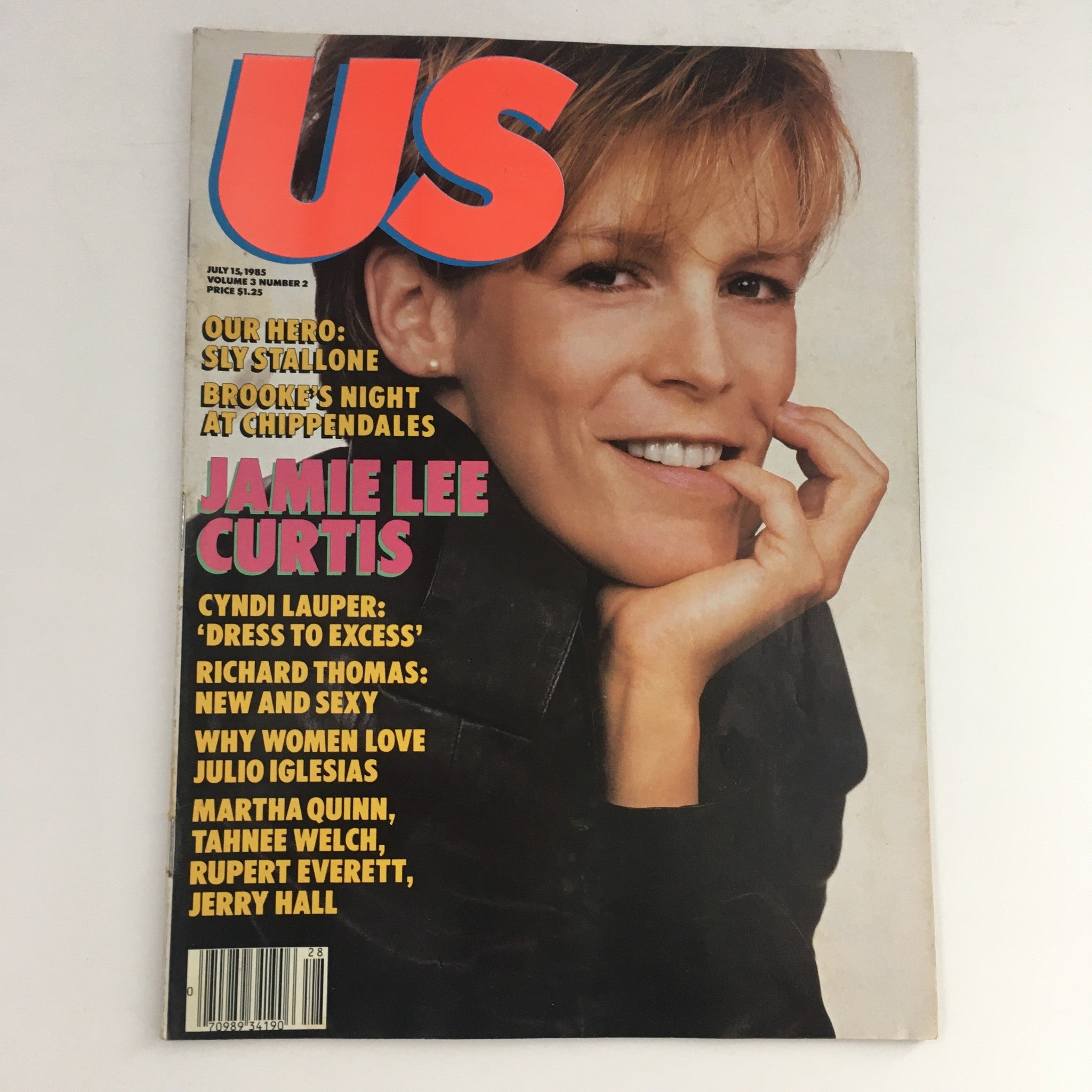 Cover of US Magazine Vol 3 #2, July 15, 1985 featuring Jamie Lee Curtis smiling with her hand on her chin, alongside headlines about Sly Stallone and other celebrities from the era.