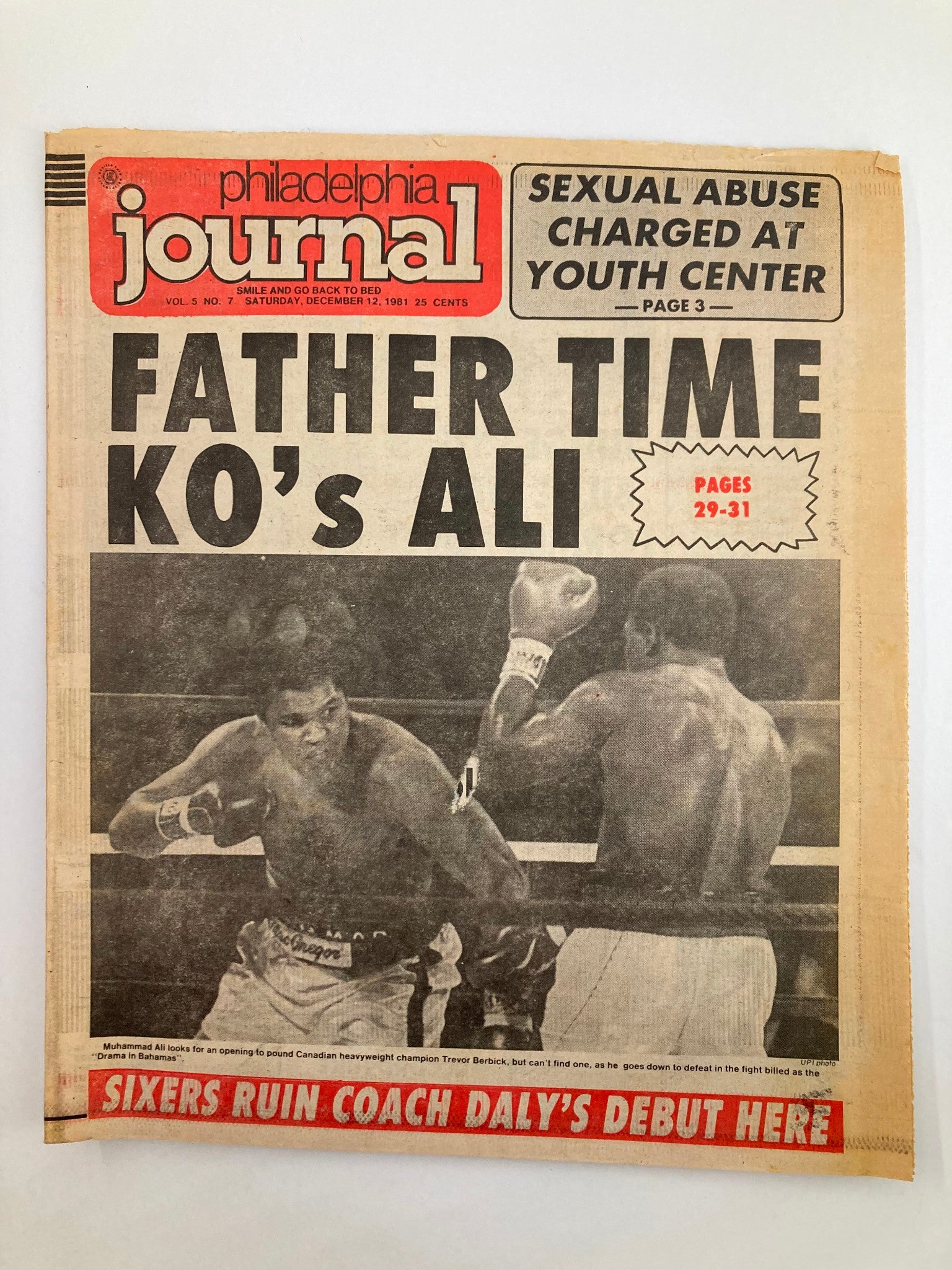 Philadelphia Journal Tabloid from December 12, 1981, featuring the headline 'Father Time KO's Ali' along with a boxing match image. Details include Muhammad Ali vs. Trevor Berbick. An important historical sports piece.