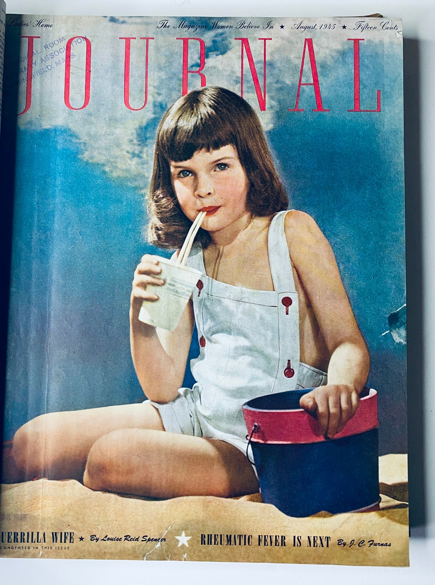 Cover of Ladies' Home Journal Bound Magazine for August 1945, depicting a young girl sipping a drink, representing American childhood in the post-war era.