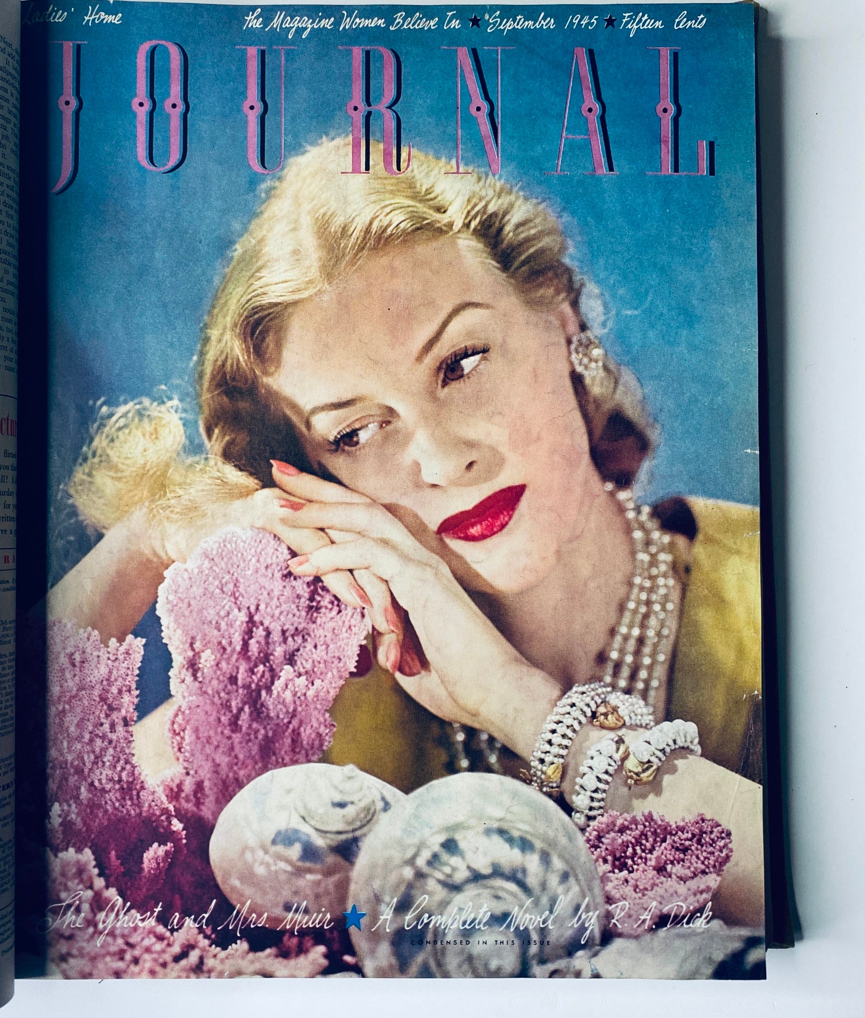 Cover of Ladies' Home Journal Bound Magazine for September 1945, displaying a stylish woman with pearls, indicative of fashion trends from the mid-20th century.
