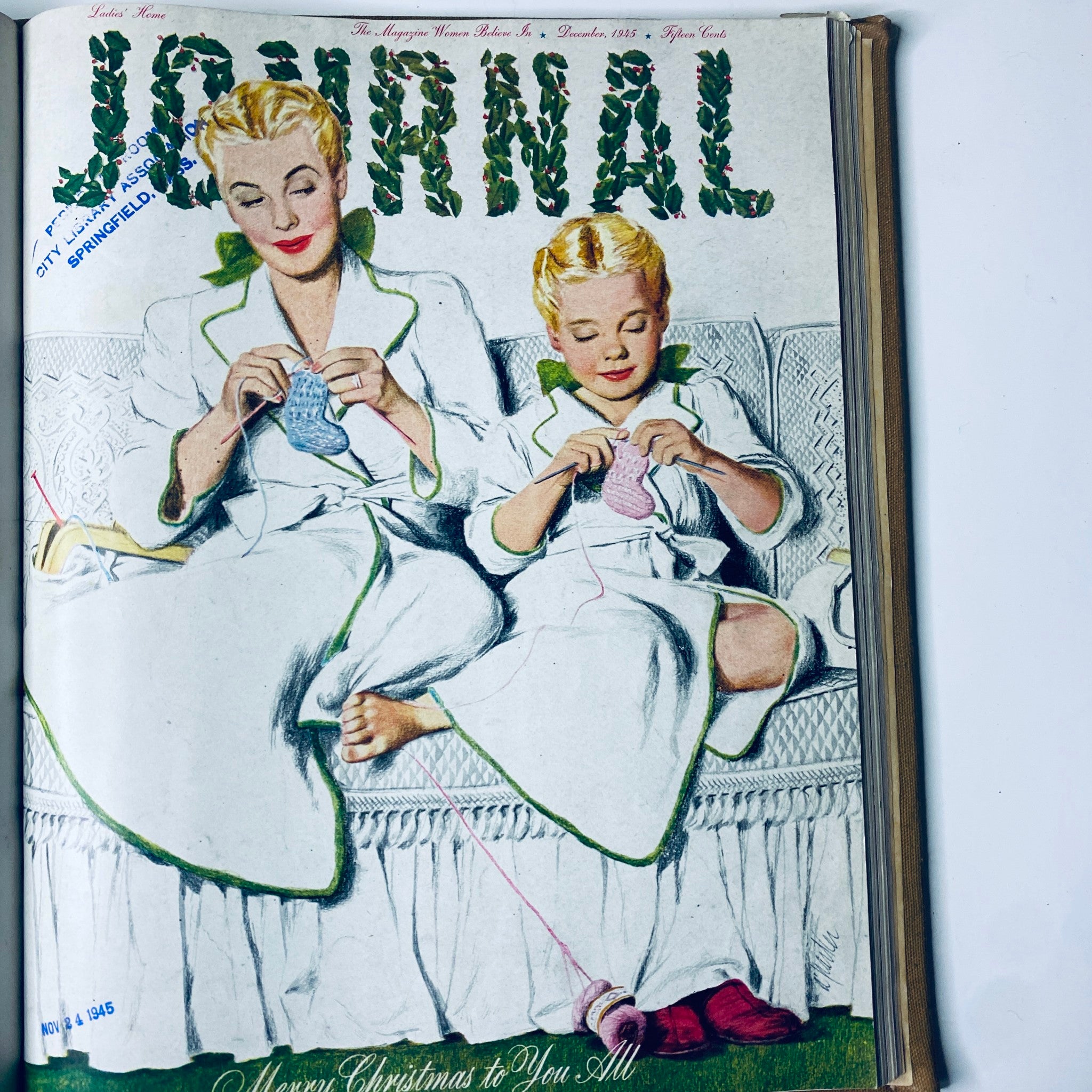 Cover of Ladies' Home Journal Library Bound Magazine 1945 showcasing a mother and child knitting, December 1945 edition.