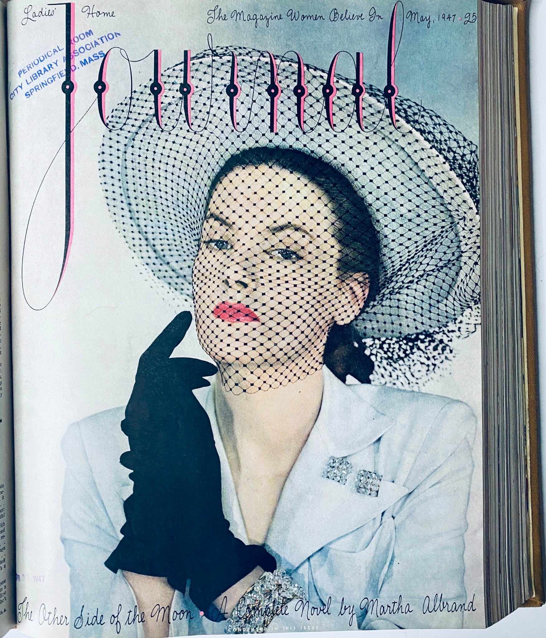 Cover of Ladies' Home Journal, May 1947 edition, showcasing a fashionable woman wearing a large hat and gloves.