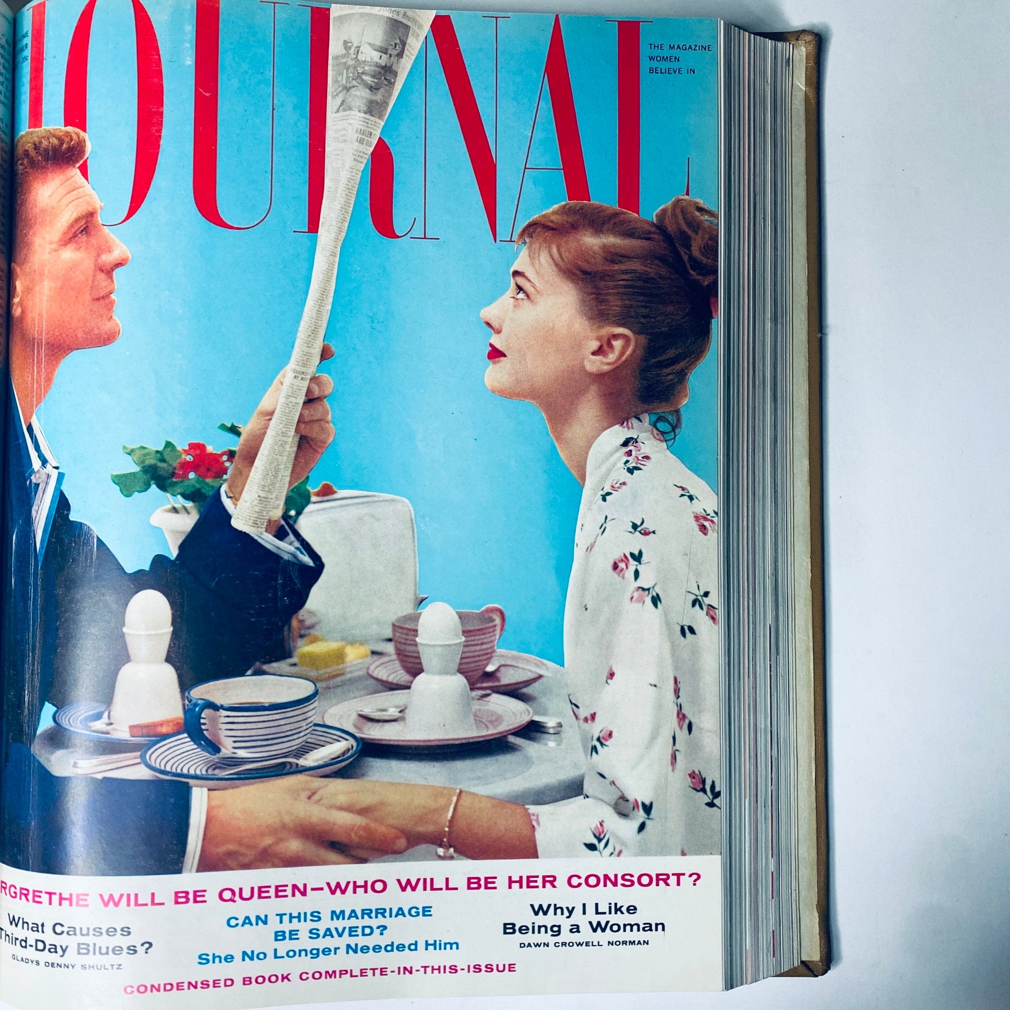 Vintage Ladies' Home Journal Bound Magazine Cover from 1957 featuring a man and woman at breakfast, showcasing cultural themes and fashion of the era.