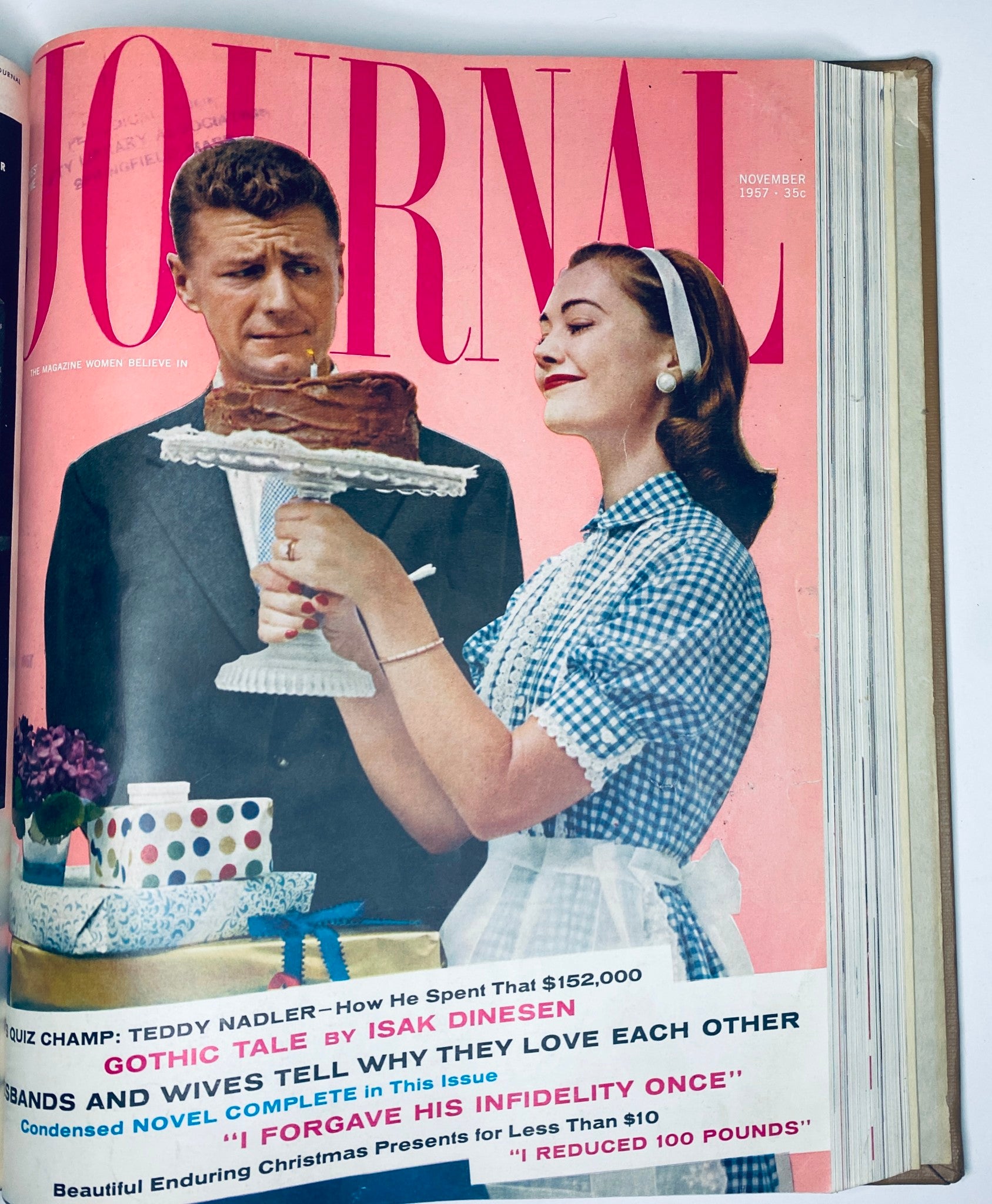November 1957 edition of the Ladies' Home Journal, depicting a woman smiling while holding a cake and a man with a concerned expression, reflecting mid-20th century domestic life.