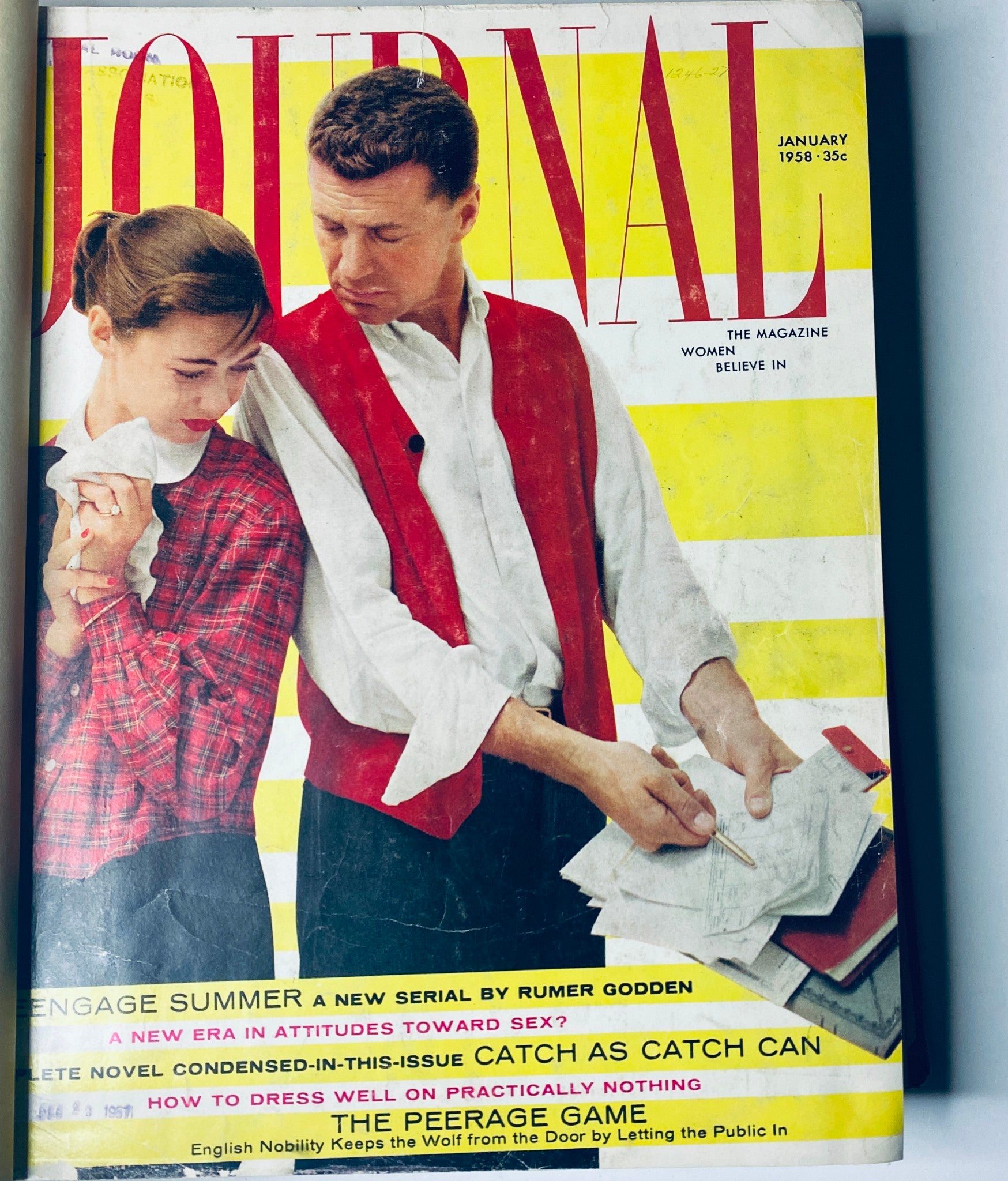 Top view of a bound Ladies' Home Journal magazine for January to June 1958, emphasizing vintage magazine appearance.