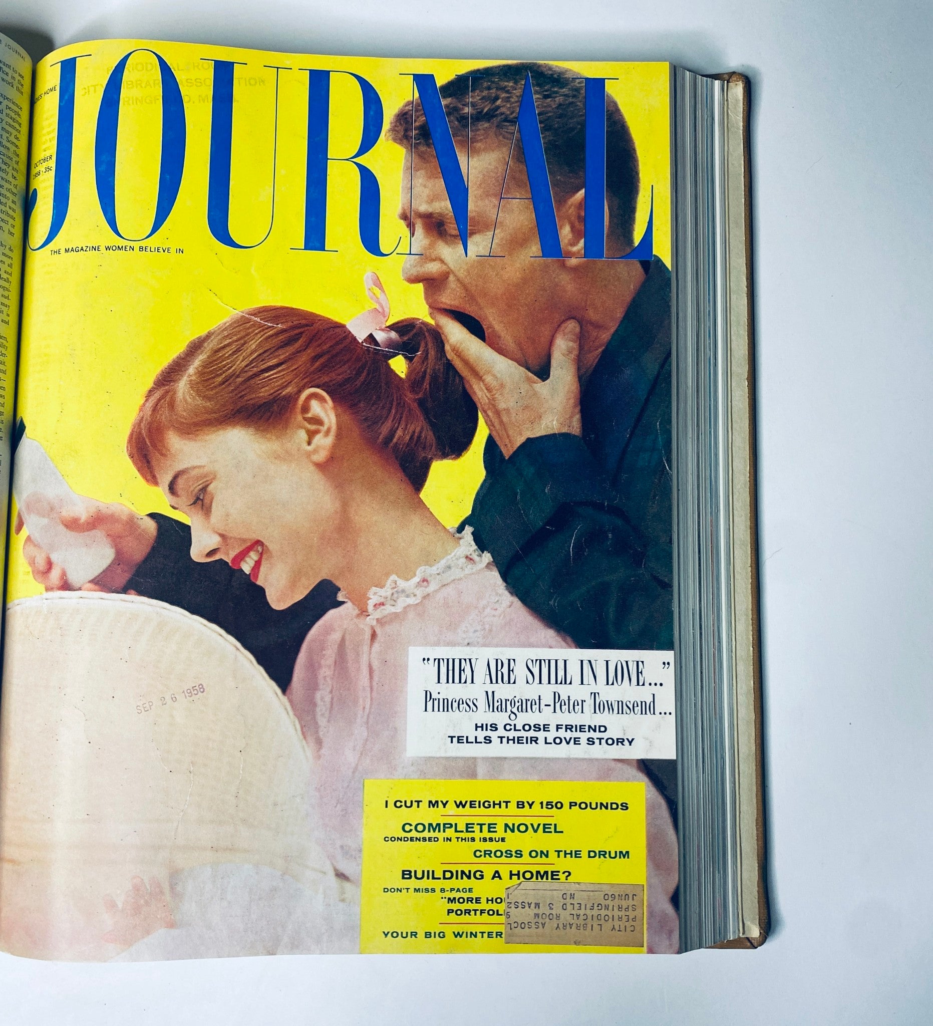 Cover of Ladies' Home Journal Bound Magazine 1958 featuring a colorful photo of a woman and a man, highlighting articles about love stories and health tips.
