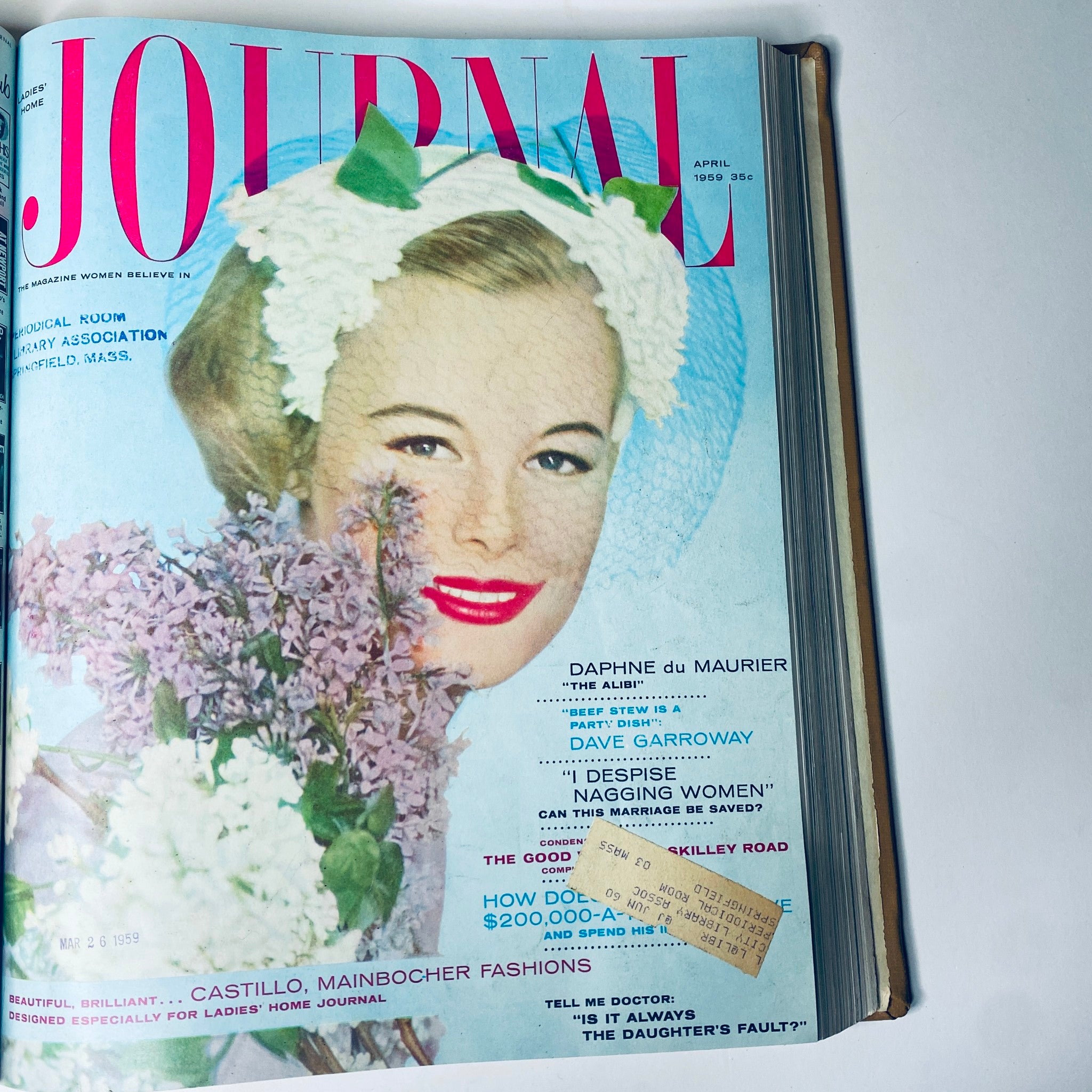Cover of Ladies' Home Journal, April 1959 issue, featuring a young woman wearing a floral headpiece and smiling, showcasing vibrant 1950s fashion and cultural trends.