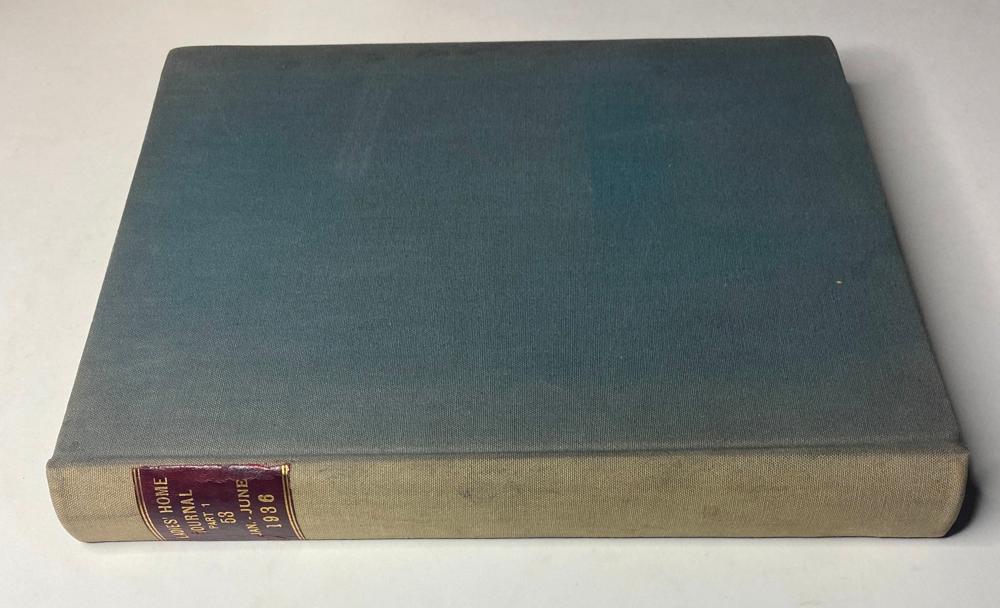 Cover view of the Ladies' Home Journal Library Bound Magazine 1936, featuring a textured blue cover with a spine label.