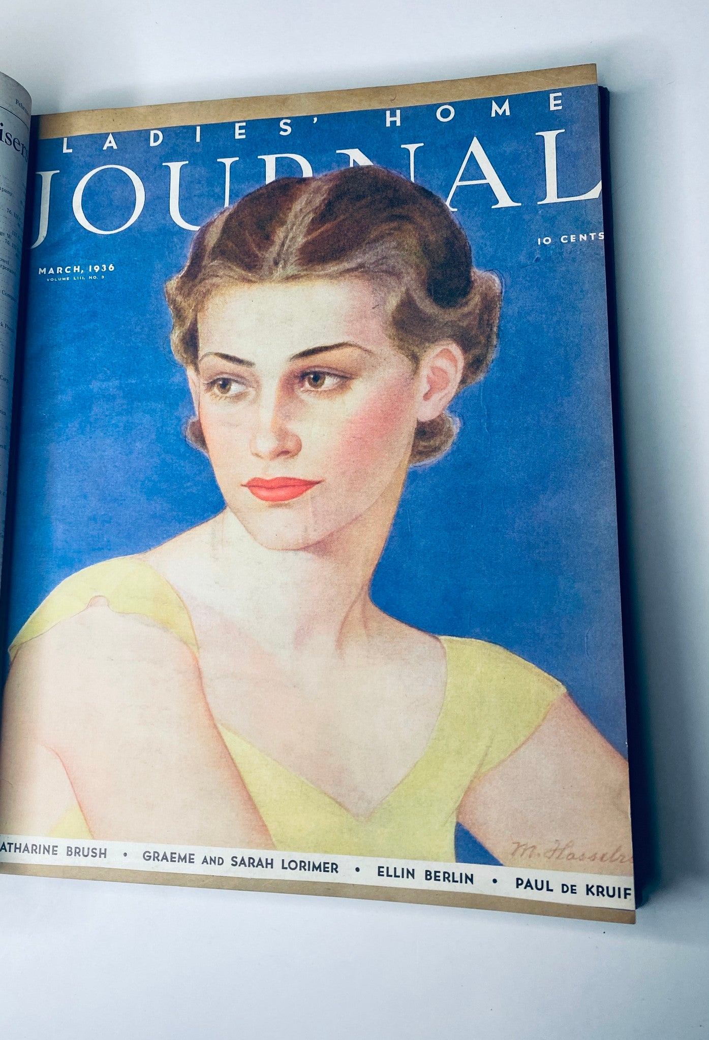 Ladies' Home Journal Bound Magazine 1936: The vibrant cover of the March 1936 issue, featuring an illustrated portrait of a young woman, highlighting the magazine's focus on women's interests, fashion, and cultural commentary.