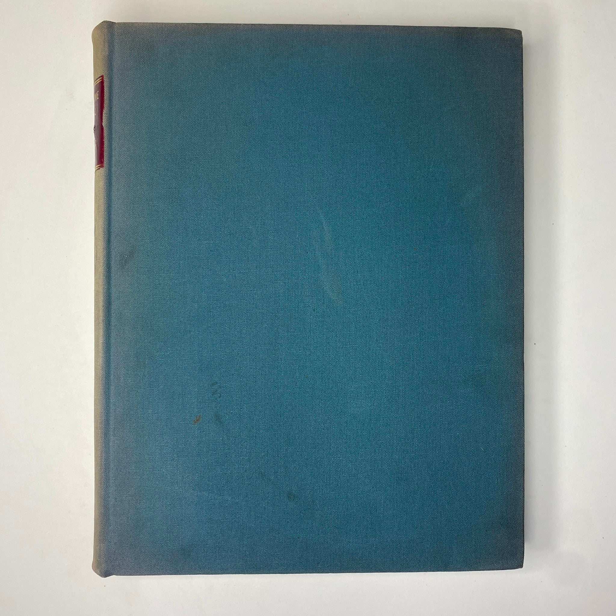 Back cover of the Ladies' Home Journal Library Bound Magazine, showcasing a solid blue design with slight wear marks.