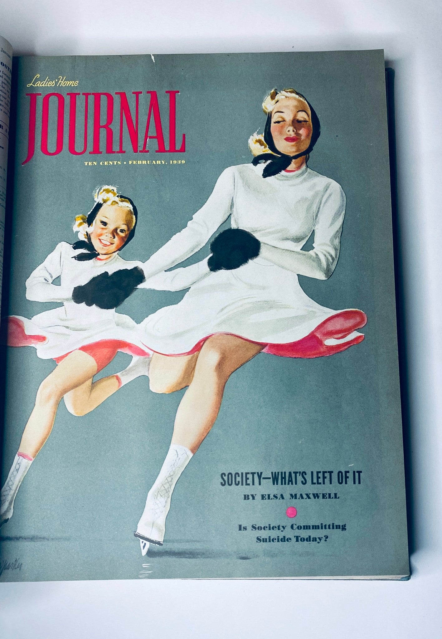 Cover of Ladies' Home Journal, February 1939, featuring a mother and daughter ice skating, striking vibrant poses against a pastel background.