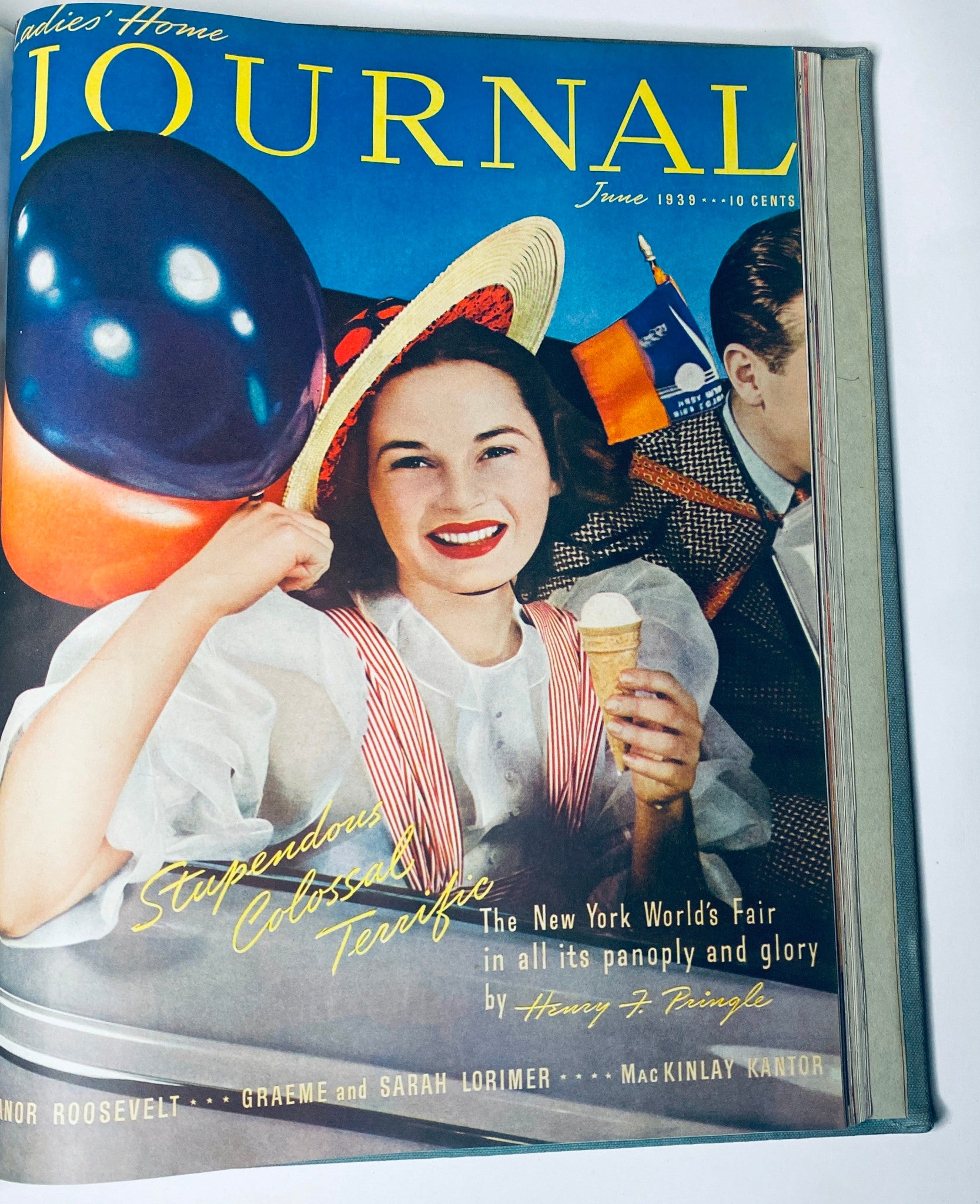 Cover of Ladies' Home Journal, June 1939, illustrating a cheerful scene at the New York World's Fair with a woman and vibrant colors.