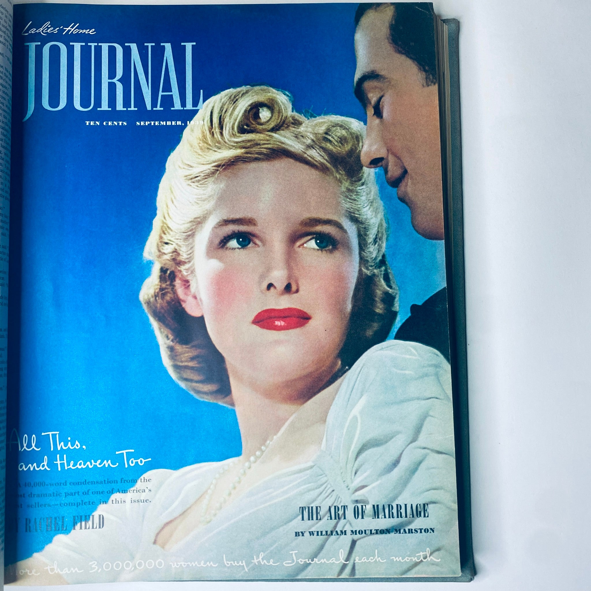 Cover of Ladies' Home Journal September 1939 showing a glamorous woman with classic hairstyles in a blue background. Full year collection from 1939 included.