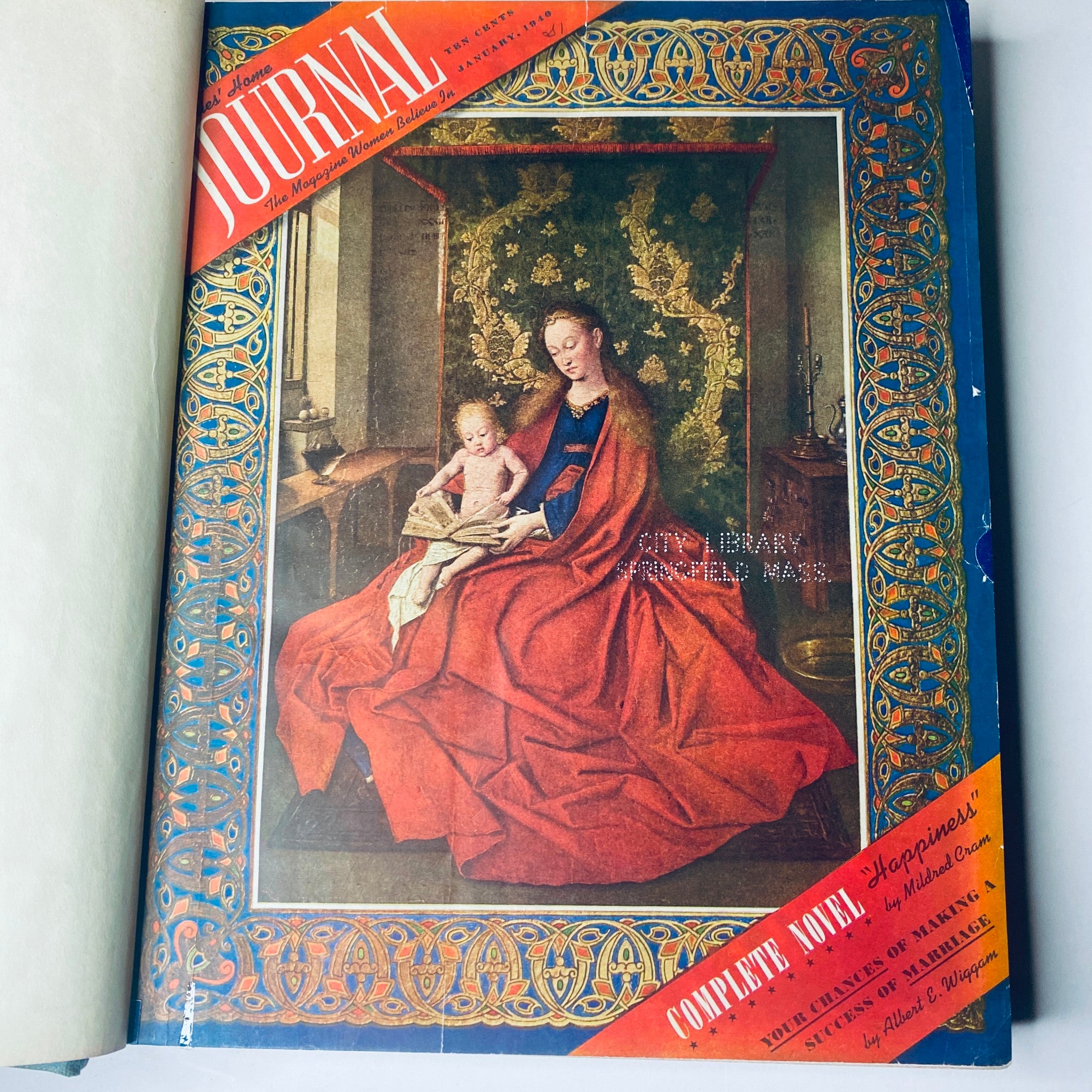 Cover of Ladies' Home Journal January 1940, featuring a religious-themed painting with a mother and child, showcasing vintage magazine designs from the 1940s.