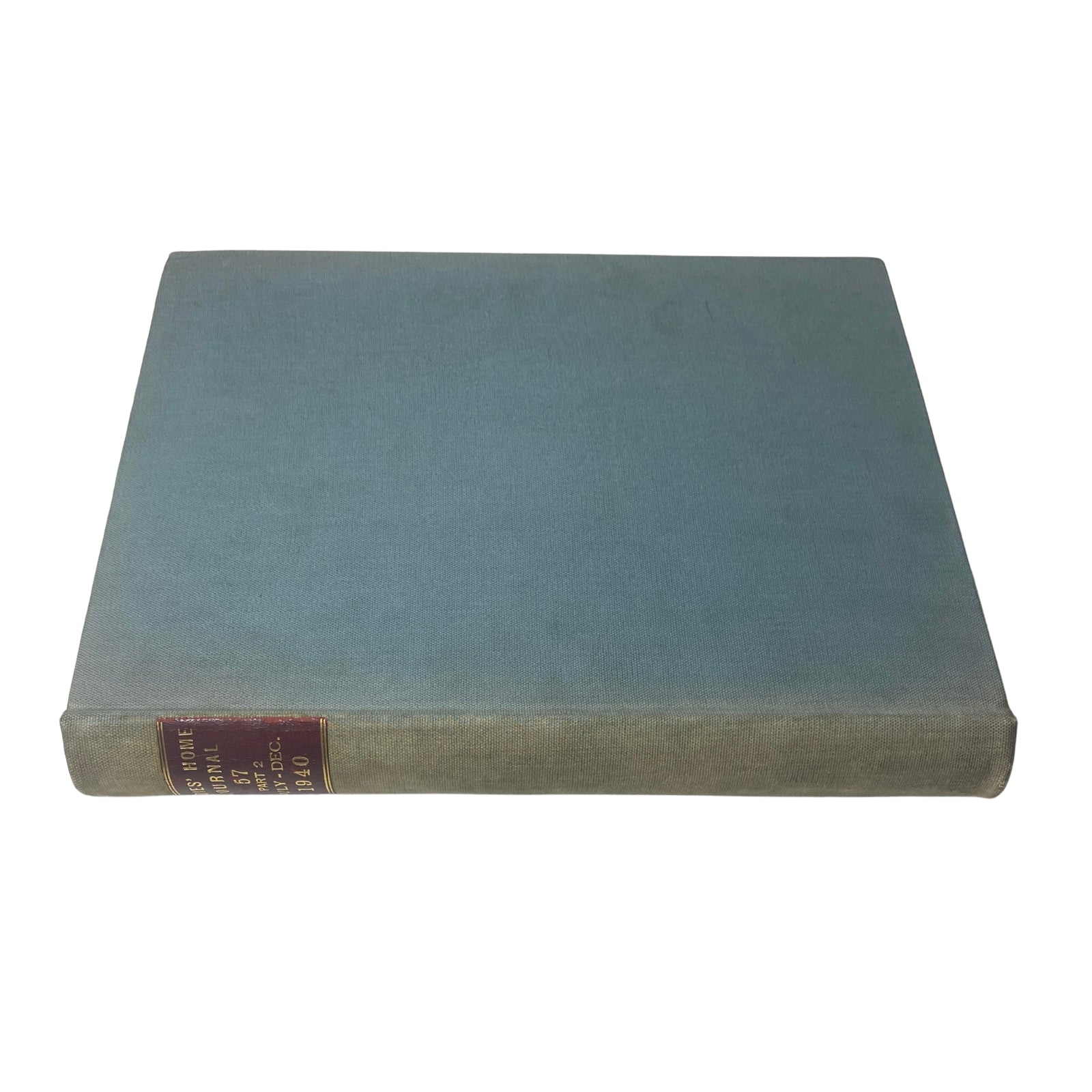 Top view of the Ladies' Home Journal Library Bound Magazine 1940, showcasing its vintage binding and the teal front cover.