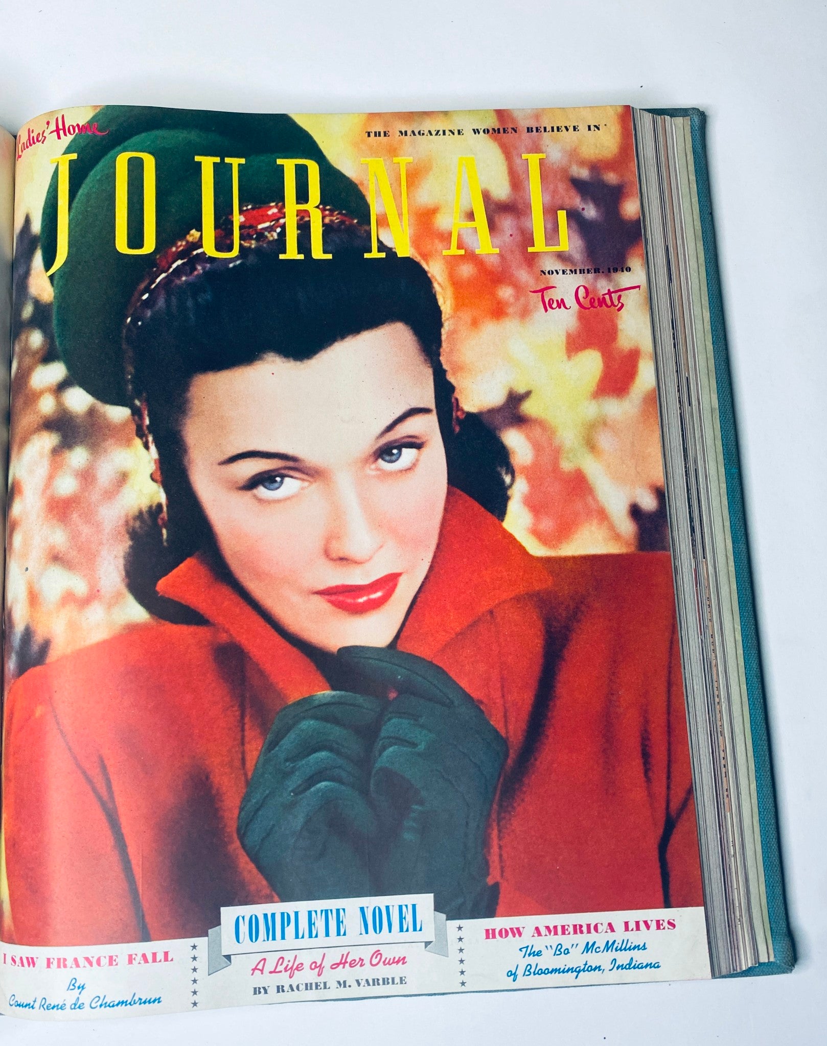 Ladies' Home Journal Bound Magazine 1940 - Cover showcasing a woman in a red coat and gloves for the November issue, reflecting winter fashion.