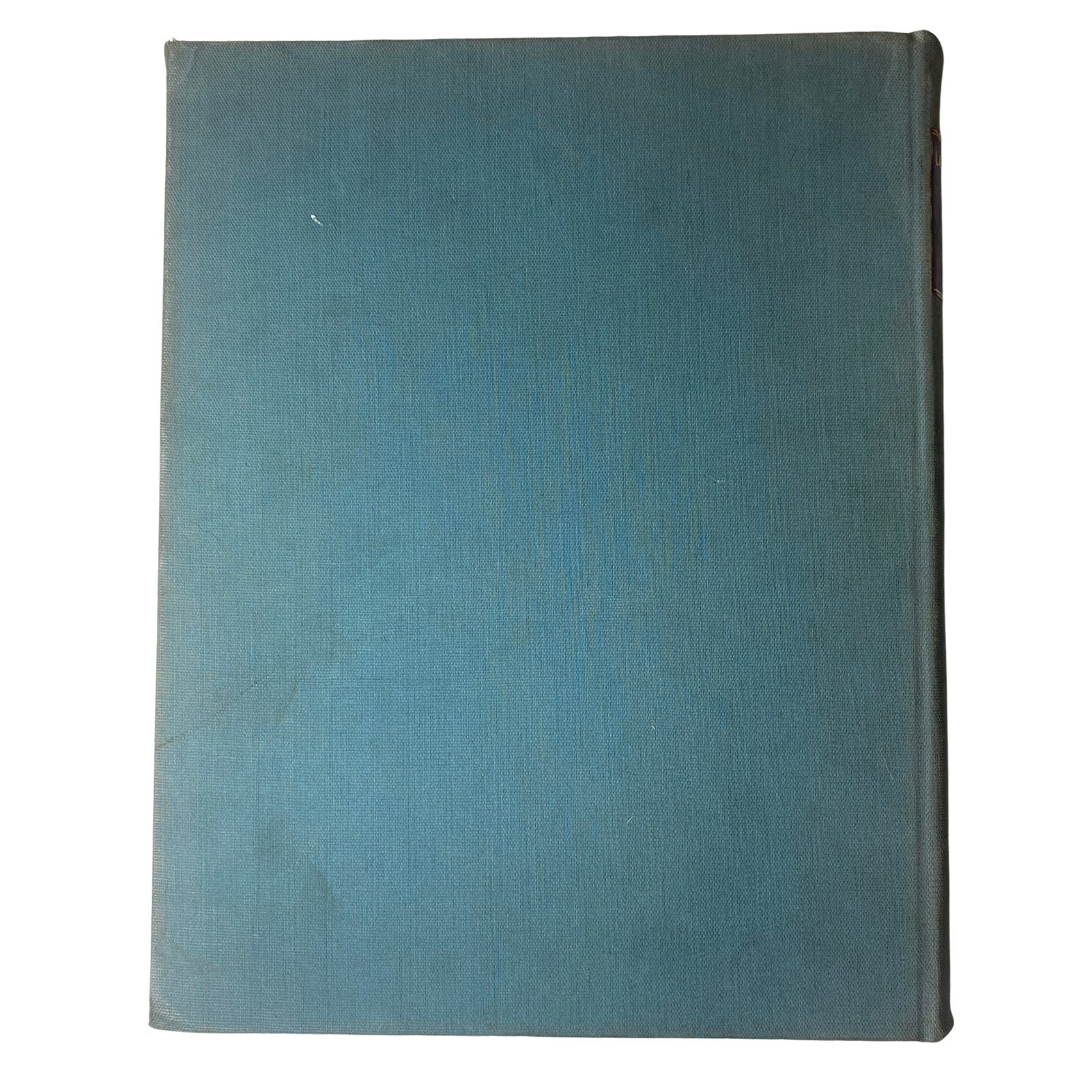The back cover of the Ladies' Home Journal Library Bound Magazine 1940, showcasing a plain blue hardcover with slight wear, representative of the magazine's vintage appeal.