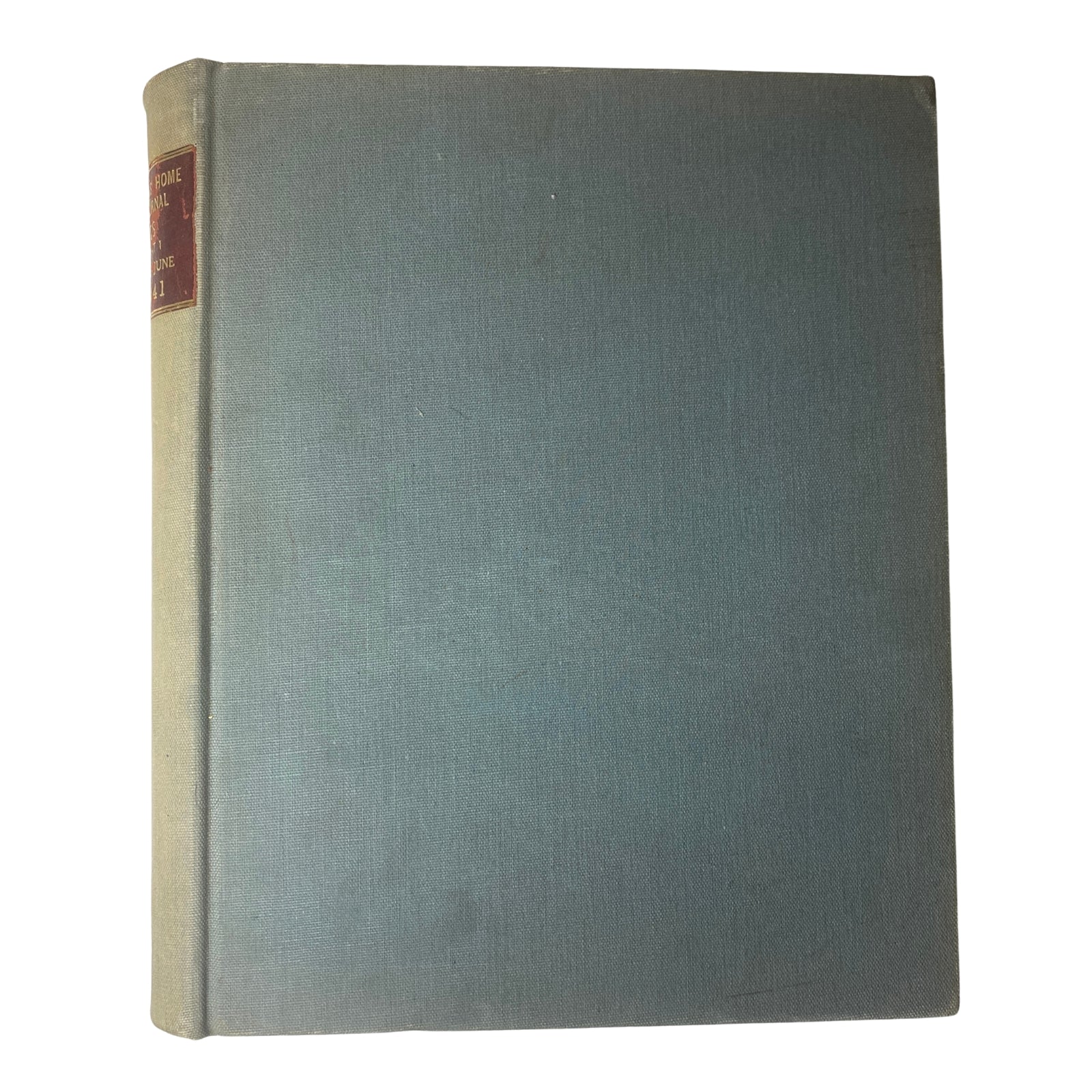 Side view of the Ladies' Home Journal Bound Magazine 1941, emphasizing the sturdy binding and well-preserved condition of this vintage collection.