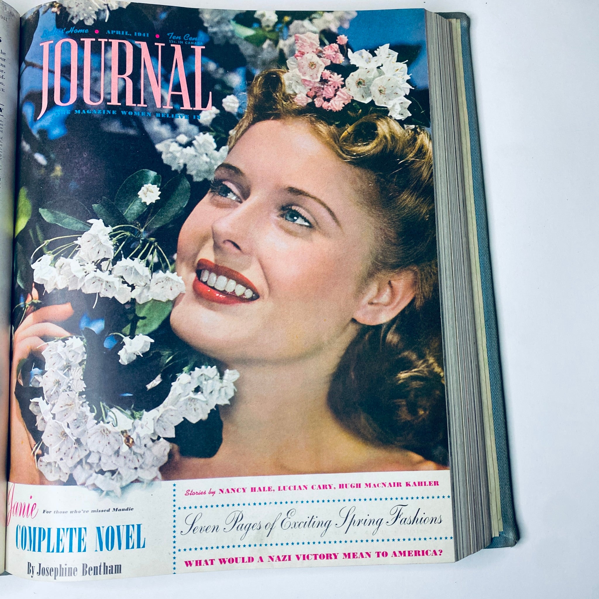 Ladies' Home Journal Bound Magazine 1941 Cover - April Issue featuring a woman with flowers, highlighting fashion trends of the time.