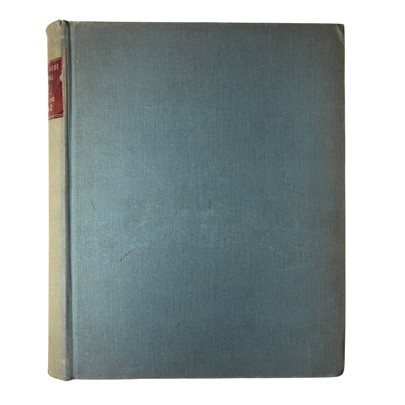 Ladies' Home Journal Library Bound Magazine 1942 showcasing the back cover of a blue bound volume, with a gold label for identification.