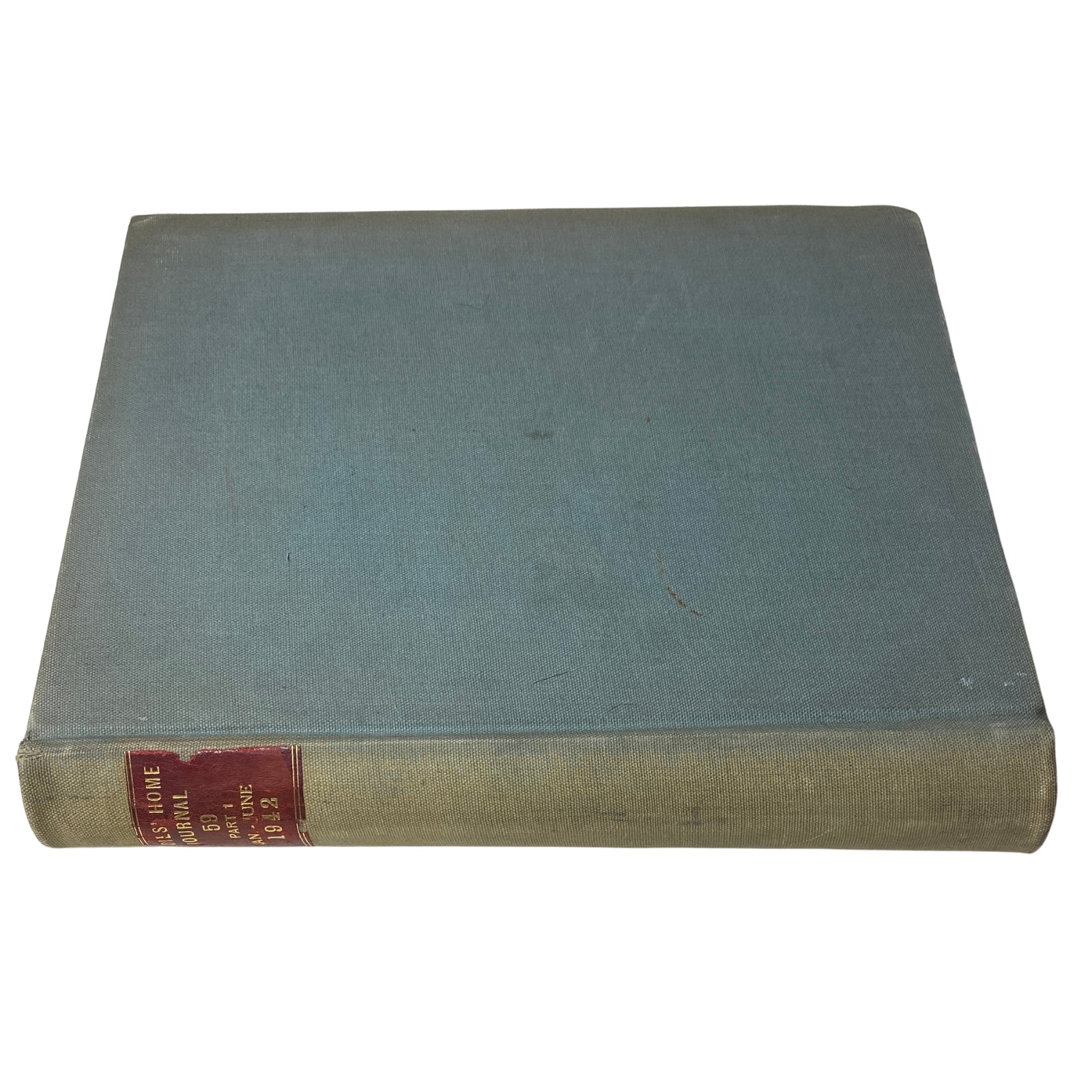 Ladies' Home Journal Library Bound Magazine 1942 displaying the side view of a blue bound volume with title and date information on the spine.
