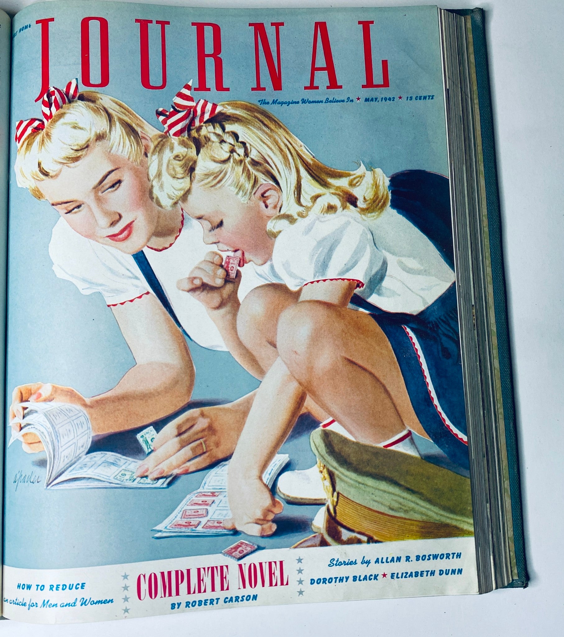 Ladies' Home Journal May 1942 magazine cover depicting a mother and daughter engaged in playful activities, illustrating family life during the 1940s.