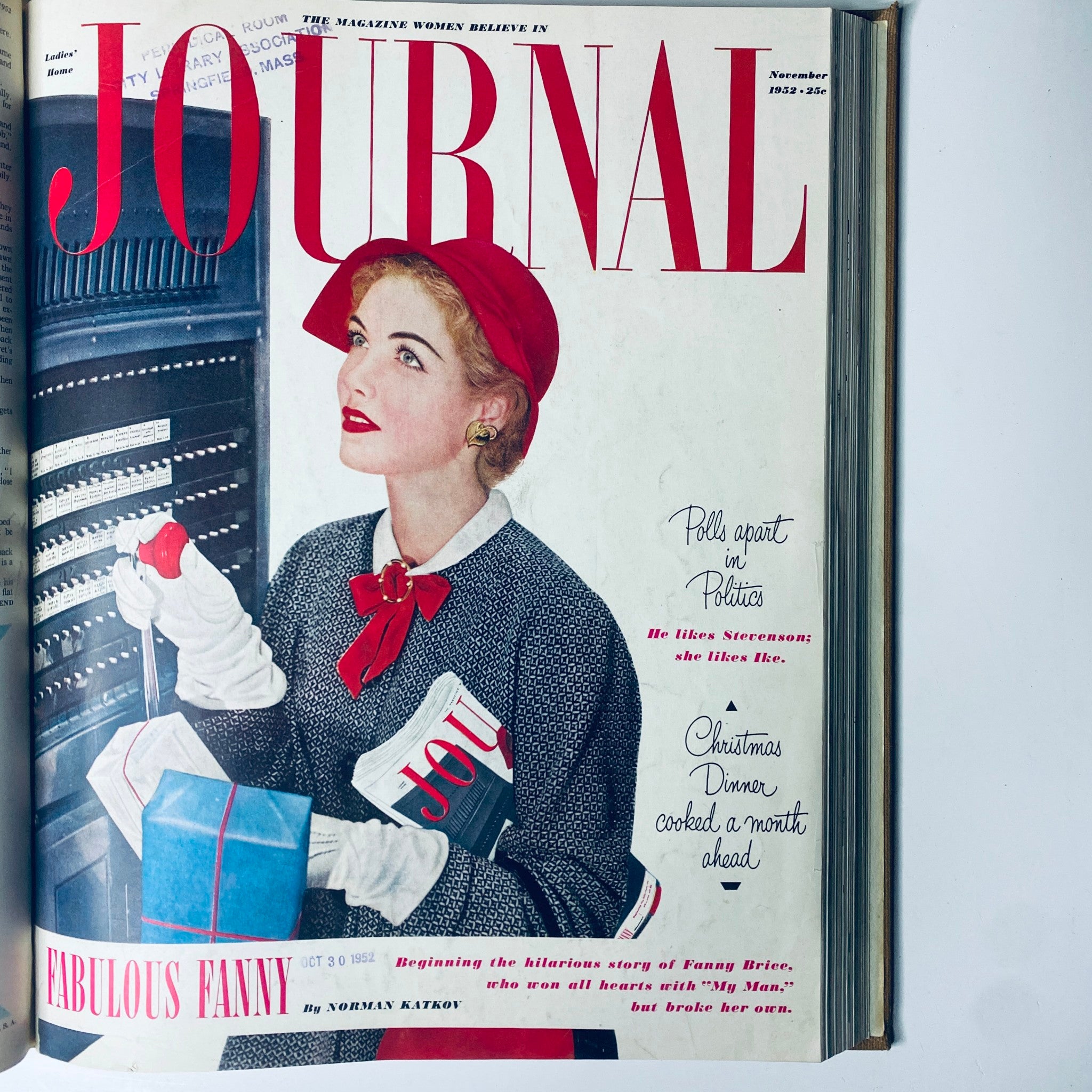 Cover of Ladies' Home Journal November 1952 depicting a woman in vintage attire, engaged with political themes, capturing the essence of 1950s societal changes.