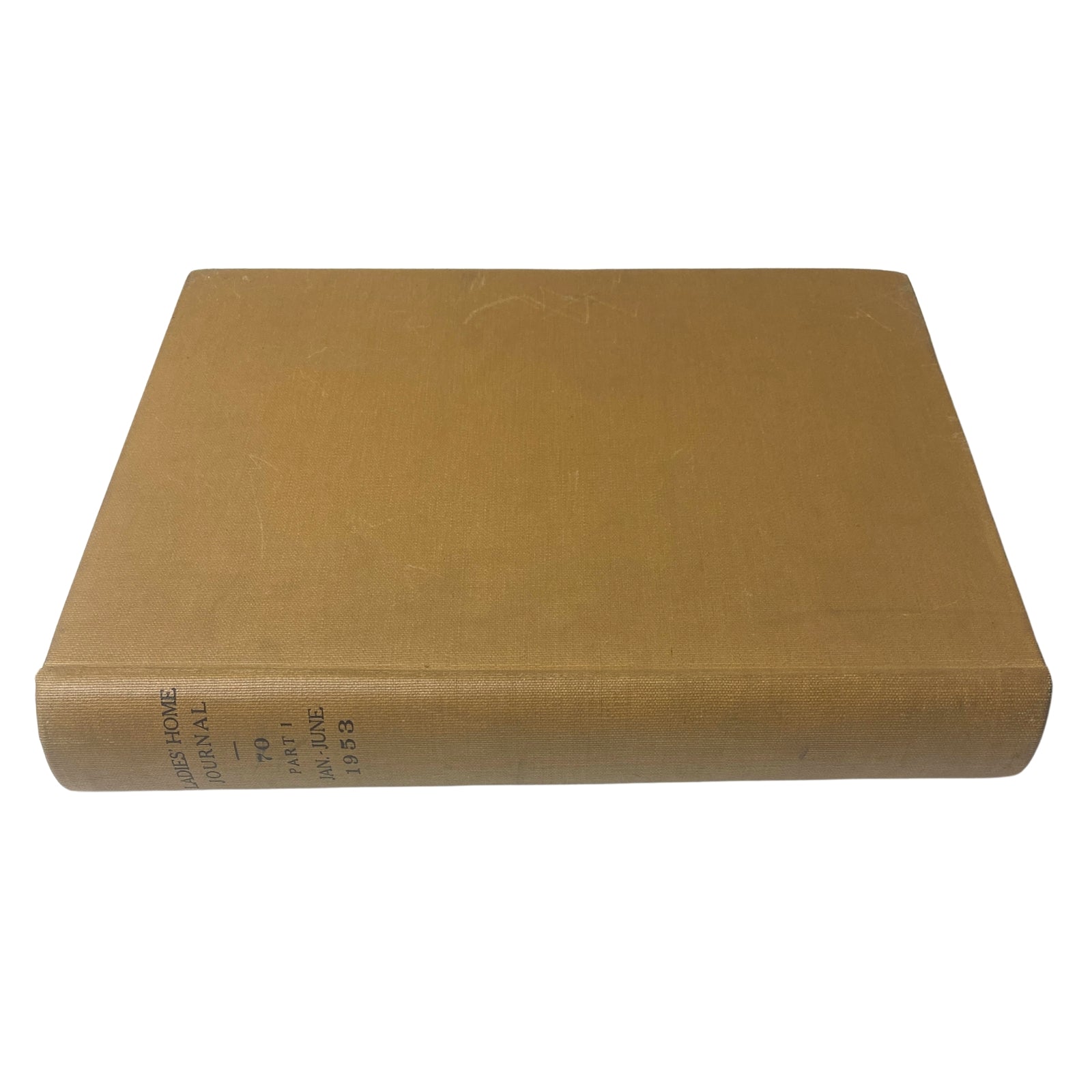 Ladies' Home Journal Library Bound Magazine 1953 Full Year January - December, capturing the side view of a single volume, emphasizing its classic style and publication year.