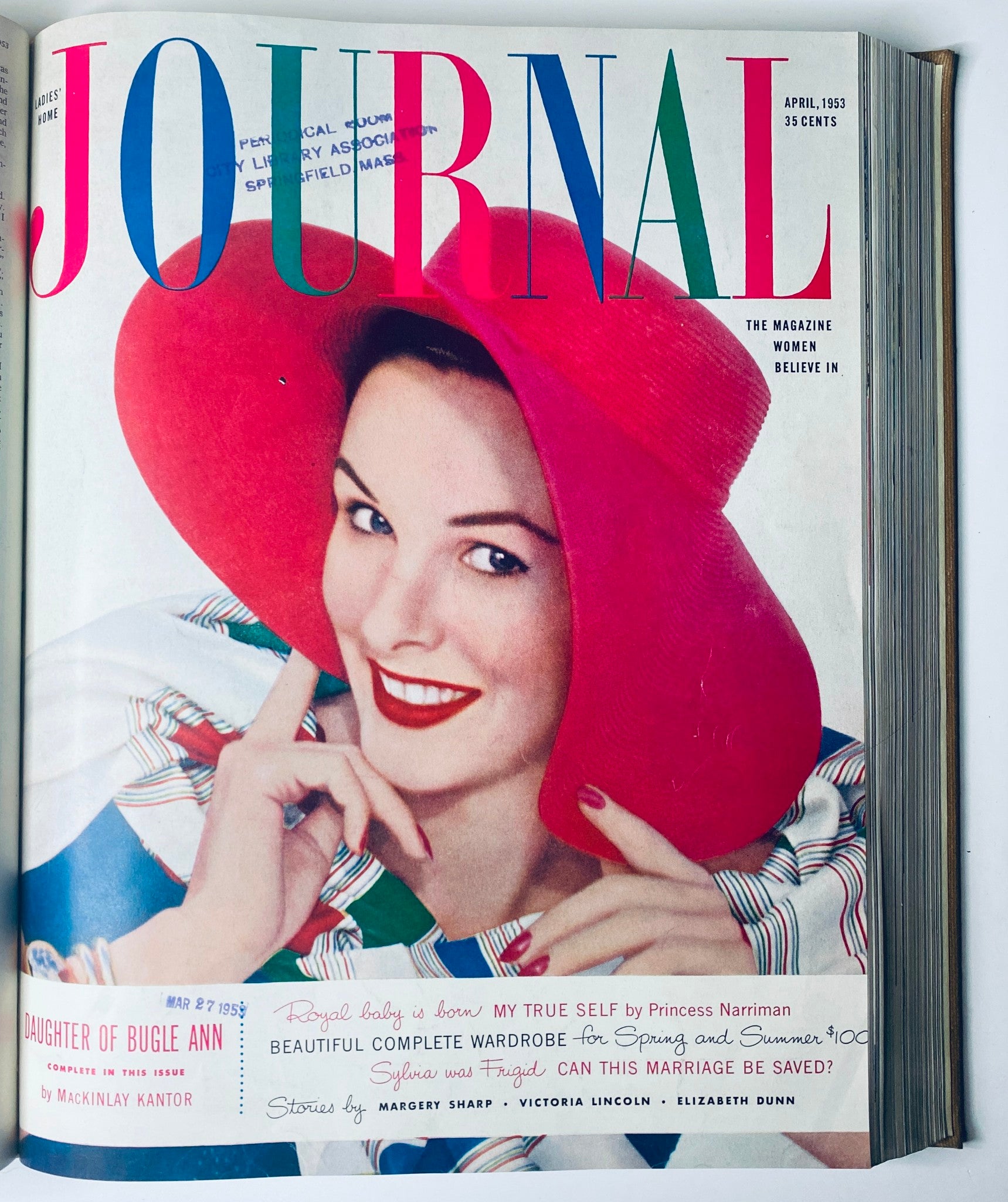 April 1953 cover of Ladies' Home Journal with a cheerful woman wearing a wide-brimmed red hat, highlighting spring fashions and stories. This image is part of the Ladies' Home Journal Library Bound Magazine 1953 Full Year January - December.