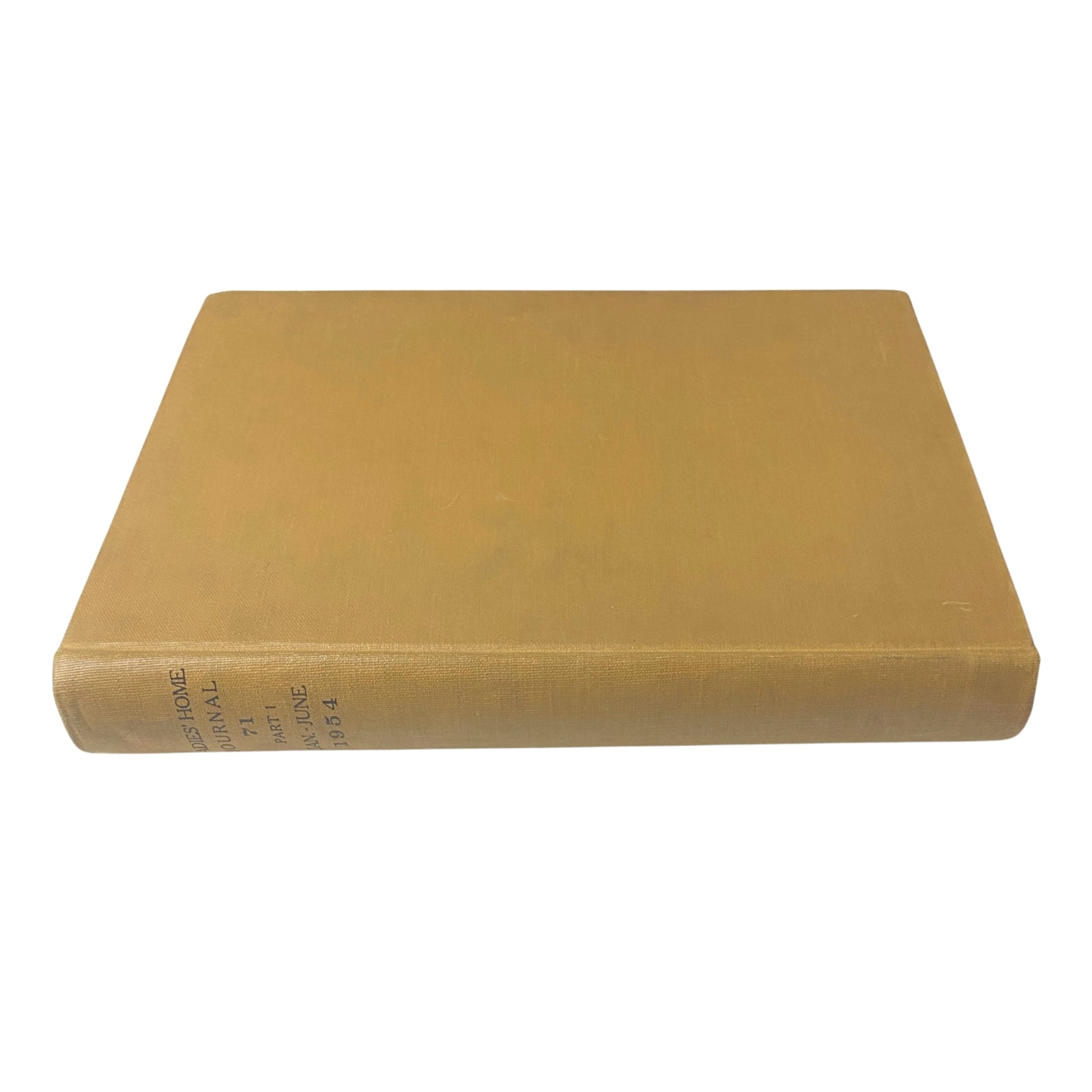 Top view of the Ladies' Home Journal Bound Magazine 1954, showing the smooth gold cover and spine details.