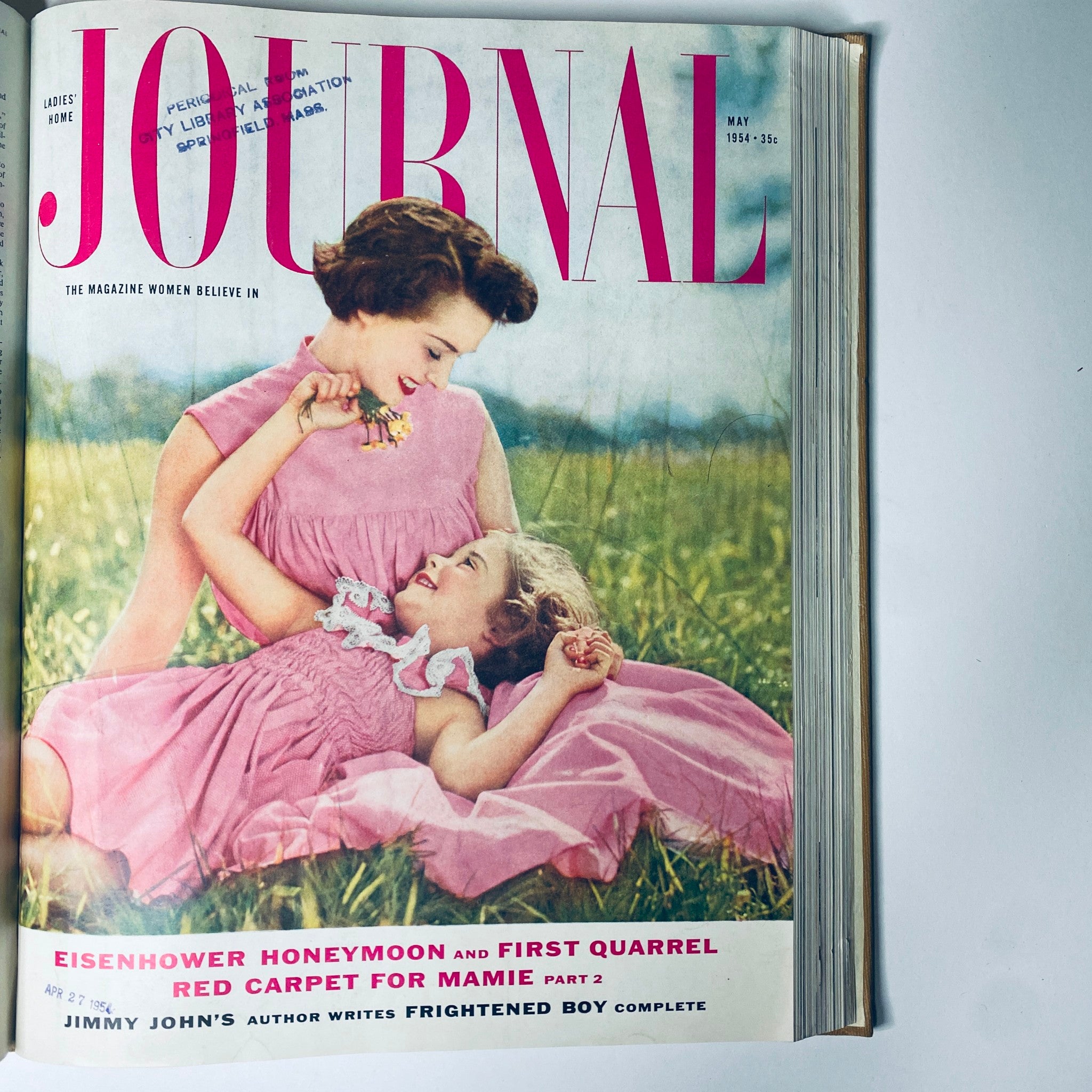 Cover of Ladies' Home Journal Magazine, May 1954 edition, featuring a mother and daughter in pink dresses on a sunny day, alongside the title 'Ladies' Home Journal Library Bound Magazine 1954 Full Year January - December'.