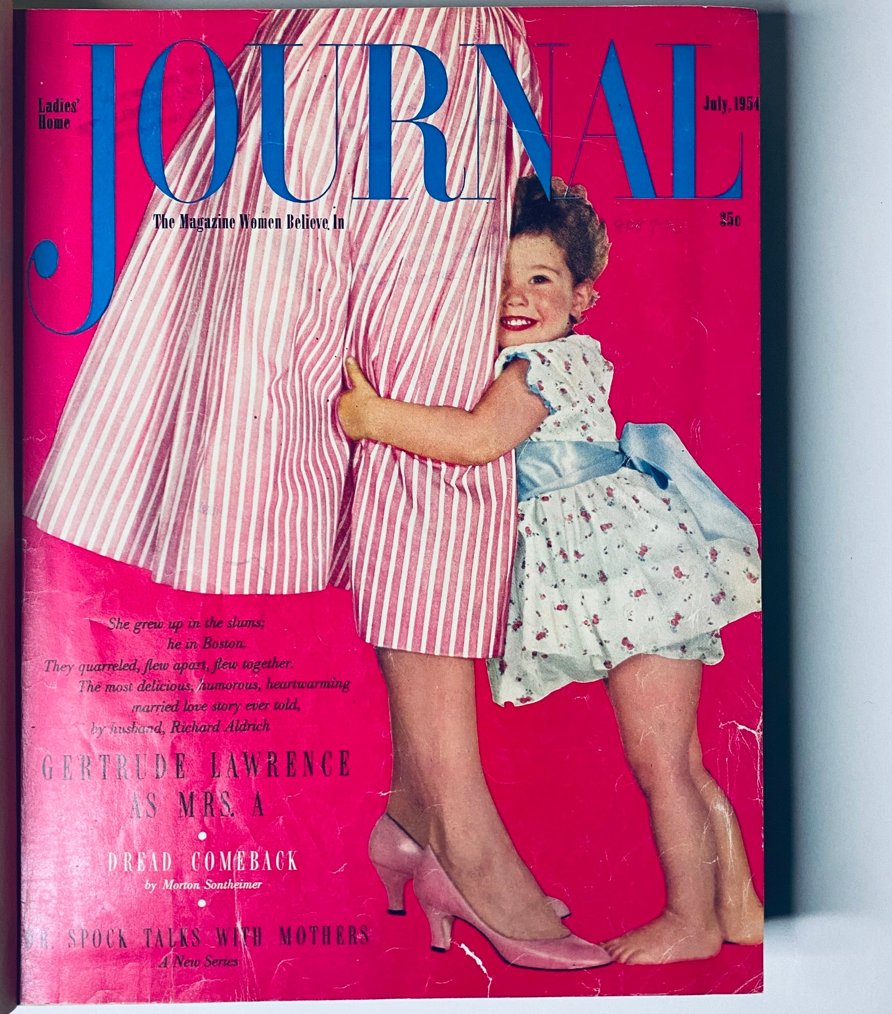 Cover of Ladies' Home Journal Magazine, July 1954 edition, depicting a young girl smiling beside her mother wearing a striped dress, emphasizing the nostalgic theme of 'Ladies' Home Journal Library Bound Magazine 1954 Full Year January - December'.