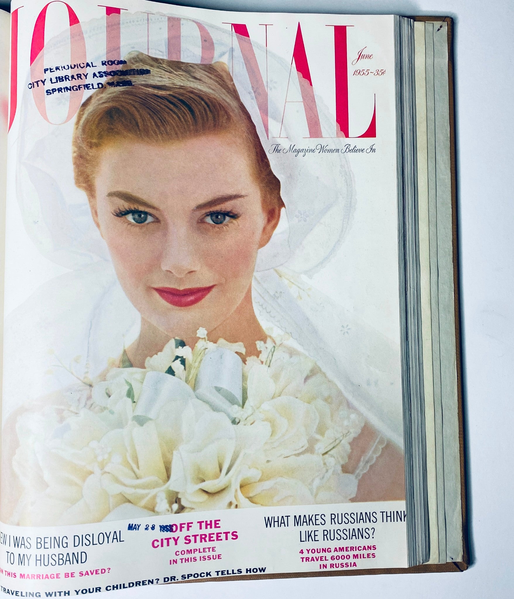 Cover of Ladies' Home Journal for June 1955, showcasing a bride with white flowers, highlighting vibrant mid-1950s fashion and cultural themes.