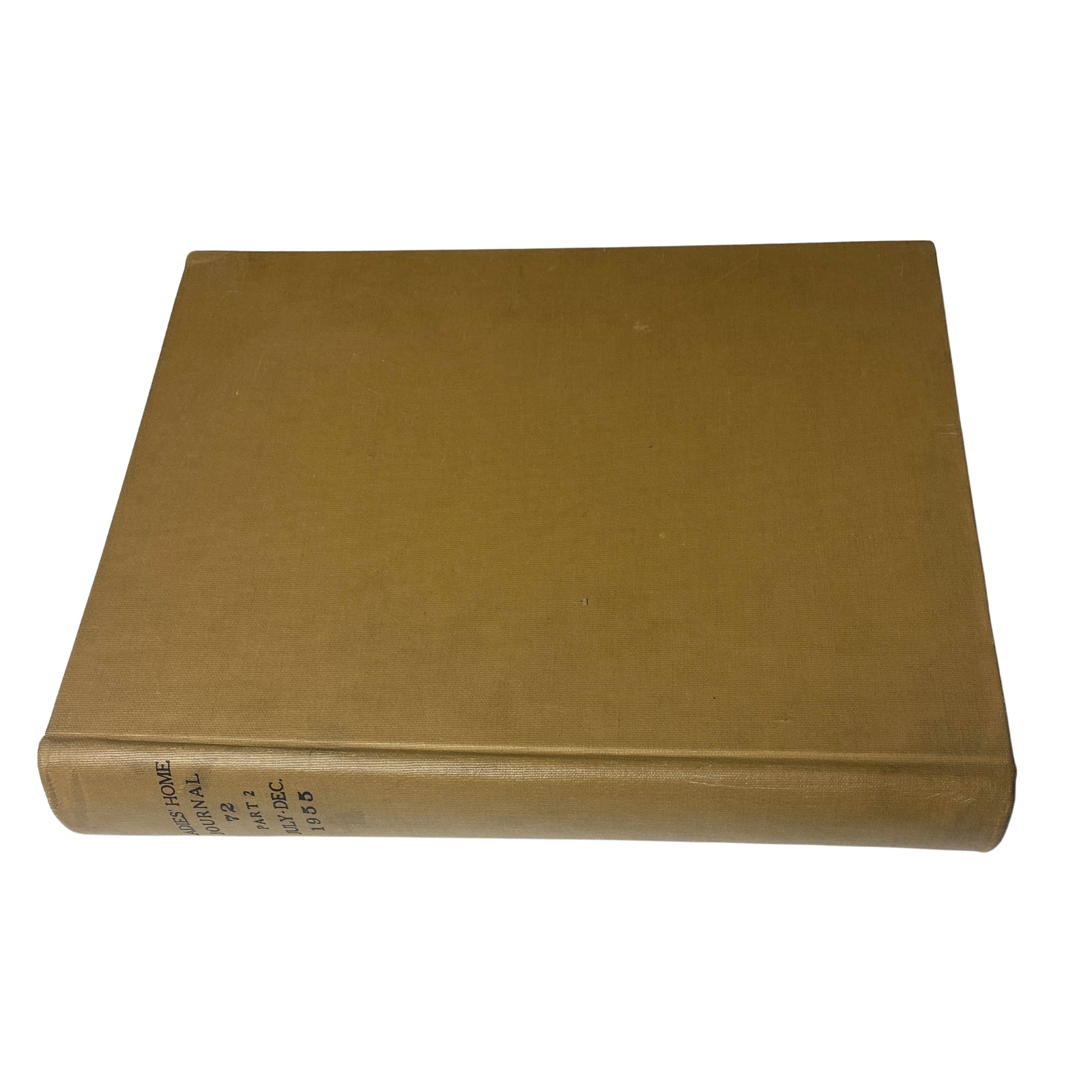 Side view of the Ladies' Home Journal Library Bound Magazine 1955, indicating the secure binding of the complete year collection.