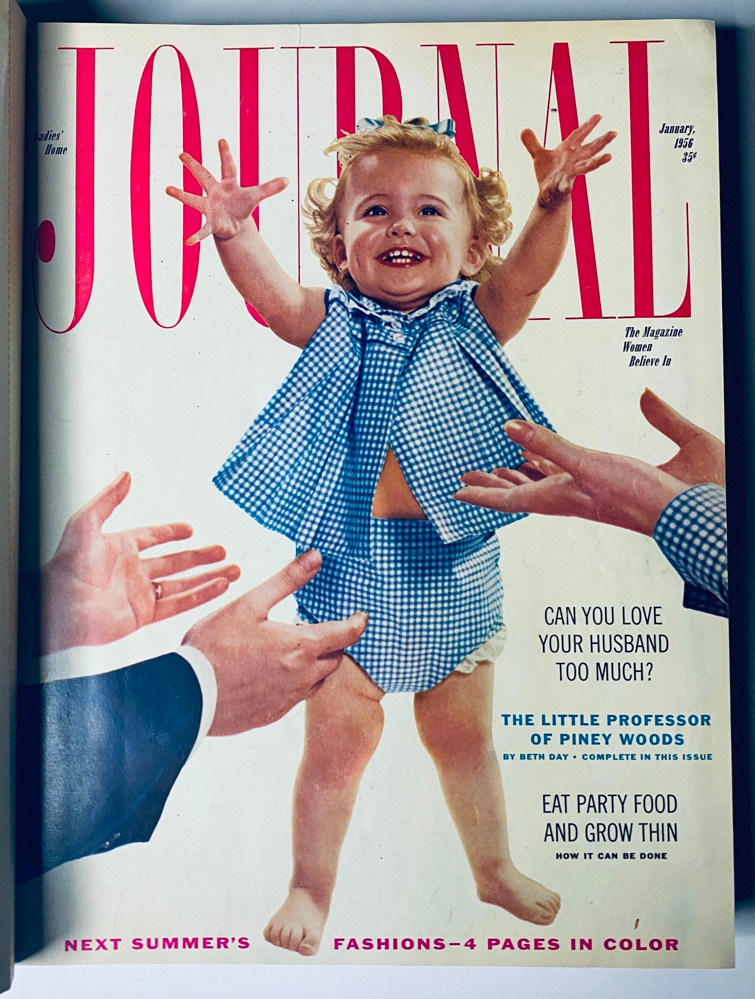 January 1956 cover of Ladies' Home Journal featuring a smiling toddler, colorful design, and various articles.