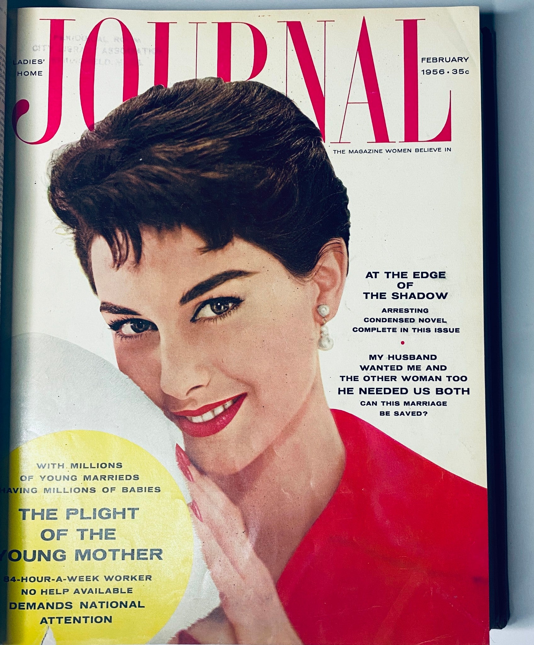 February 1956 cover of Ladies' Home Journal featuring a glamorous woman in a red dress, with engaging article titles.