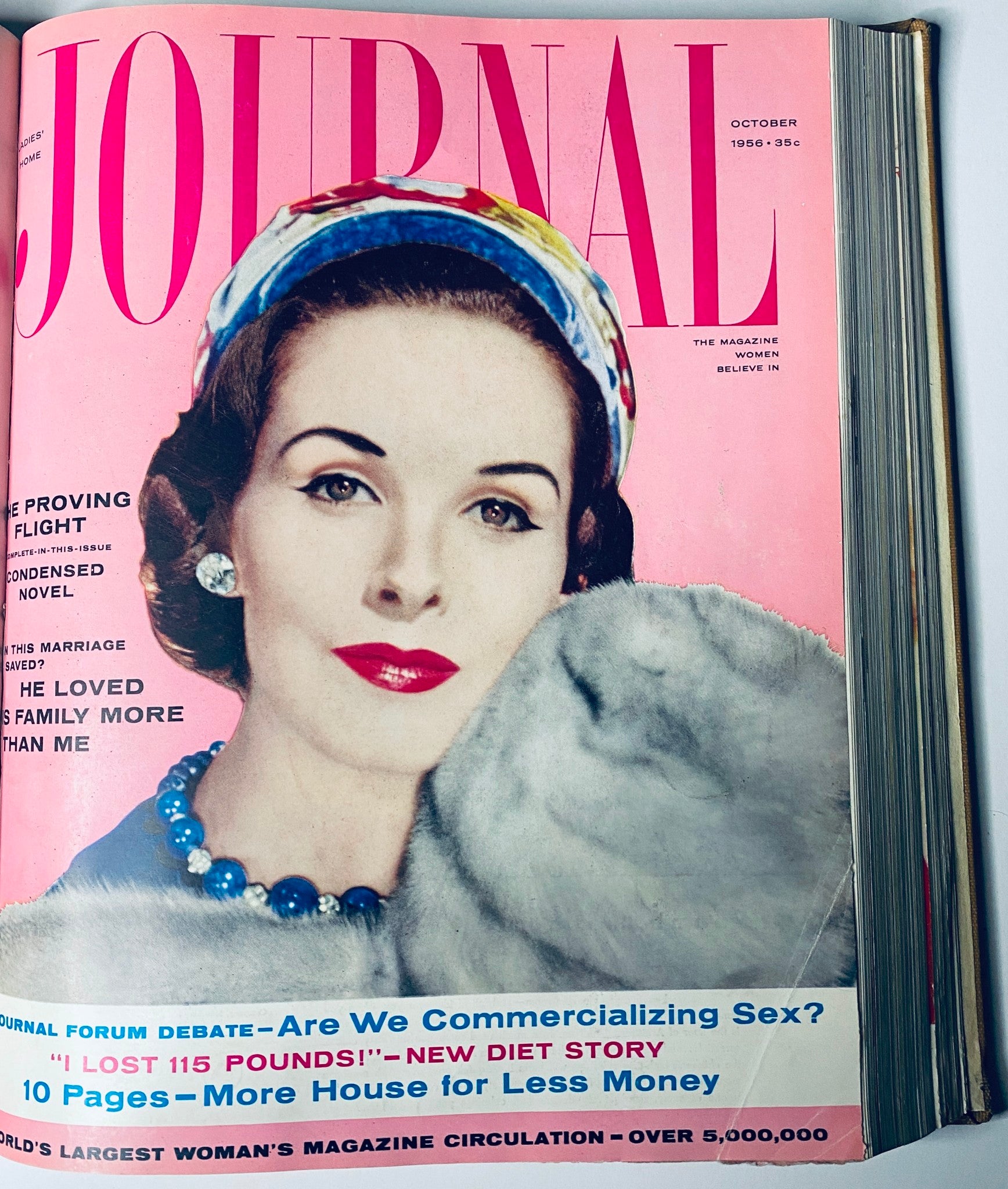 Cover of Ladies' Home Journal October 1956 showcasing a glamorous model with a colorful headscarf and bold magazine title, representing mid-century fashion and culture.