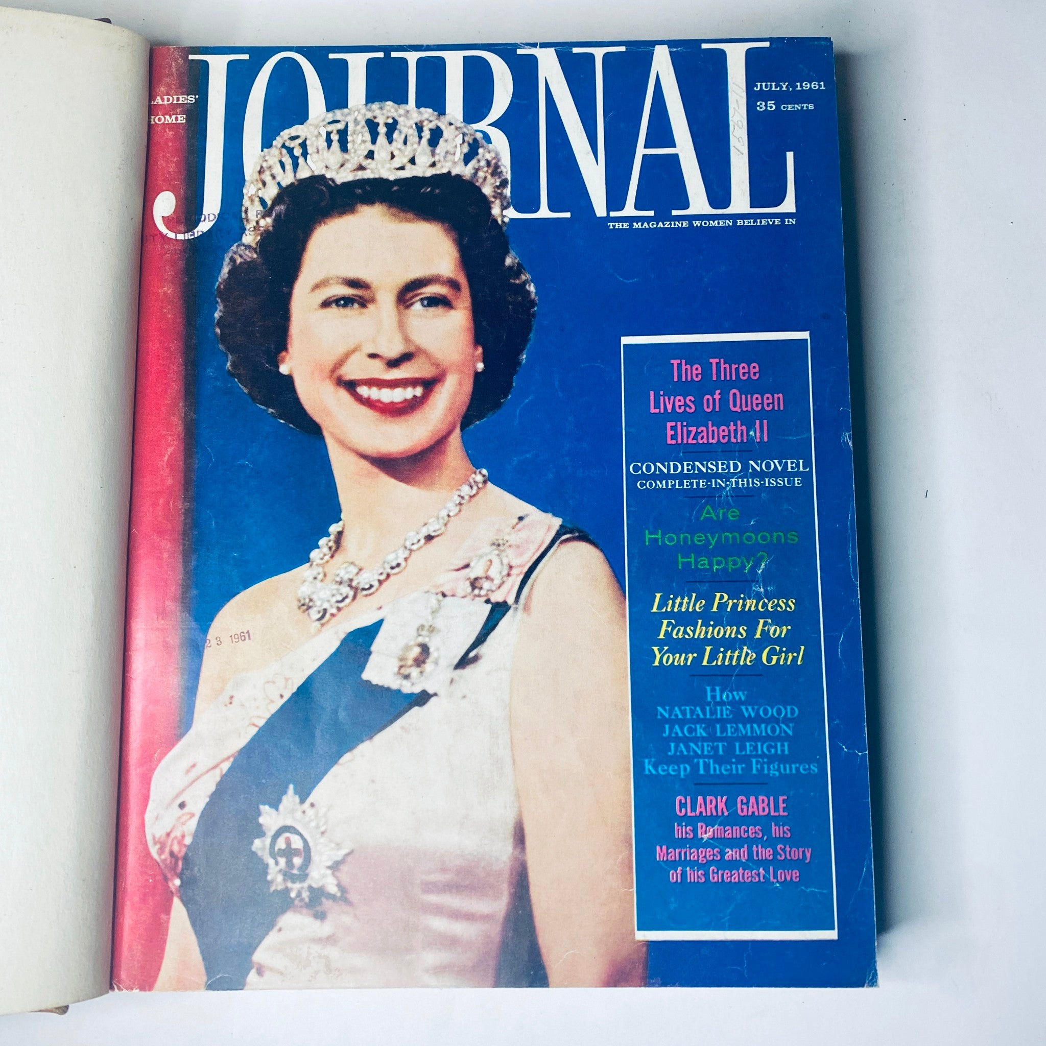 Ladies' Home Journal Bound Magazine, July 1961 issue featuring a smiling cover portrait of Queen Elizabeth II, adorned with a crown and necklace.