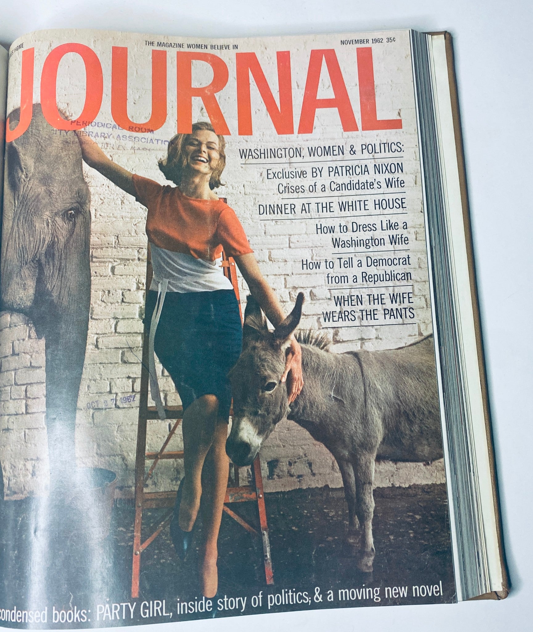 Cover of Ladies' Home Journal Bound Magazine November 1962 featuring a woman with an elephant and a donkey, highlighting political themes and women's roles in society.