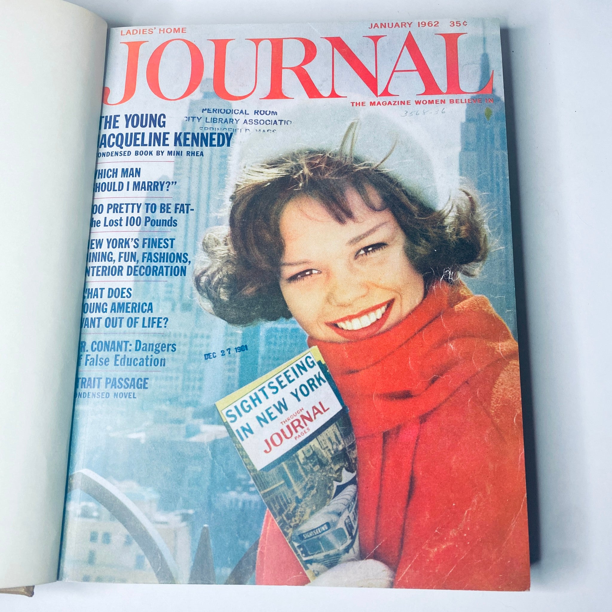 Ladies' Home Journal Library Bound Magazine 1962 Full Year January - December - January 1962 issue cover featuring a smiling woman in a red scarf, emphasizing the magazine's focus on lifestyle and culture.