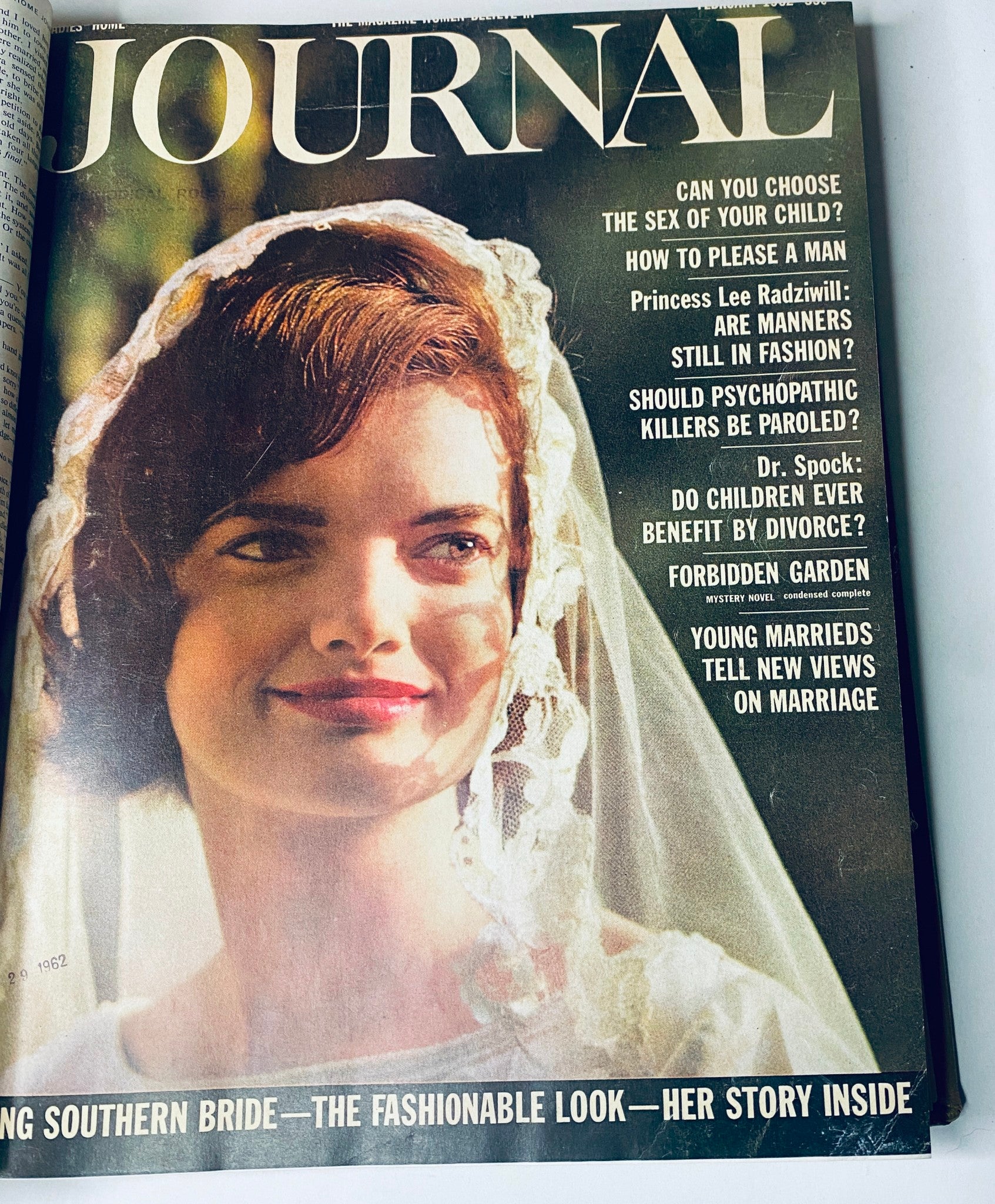 Ladies' Home Journal Library Bound Magazine 1962 Full Year January - December - Cover of the February 1962 issue with a bridal theme, showcasing a woman in a veil, indicative of the magazine's content on fashion and society.