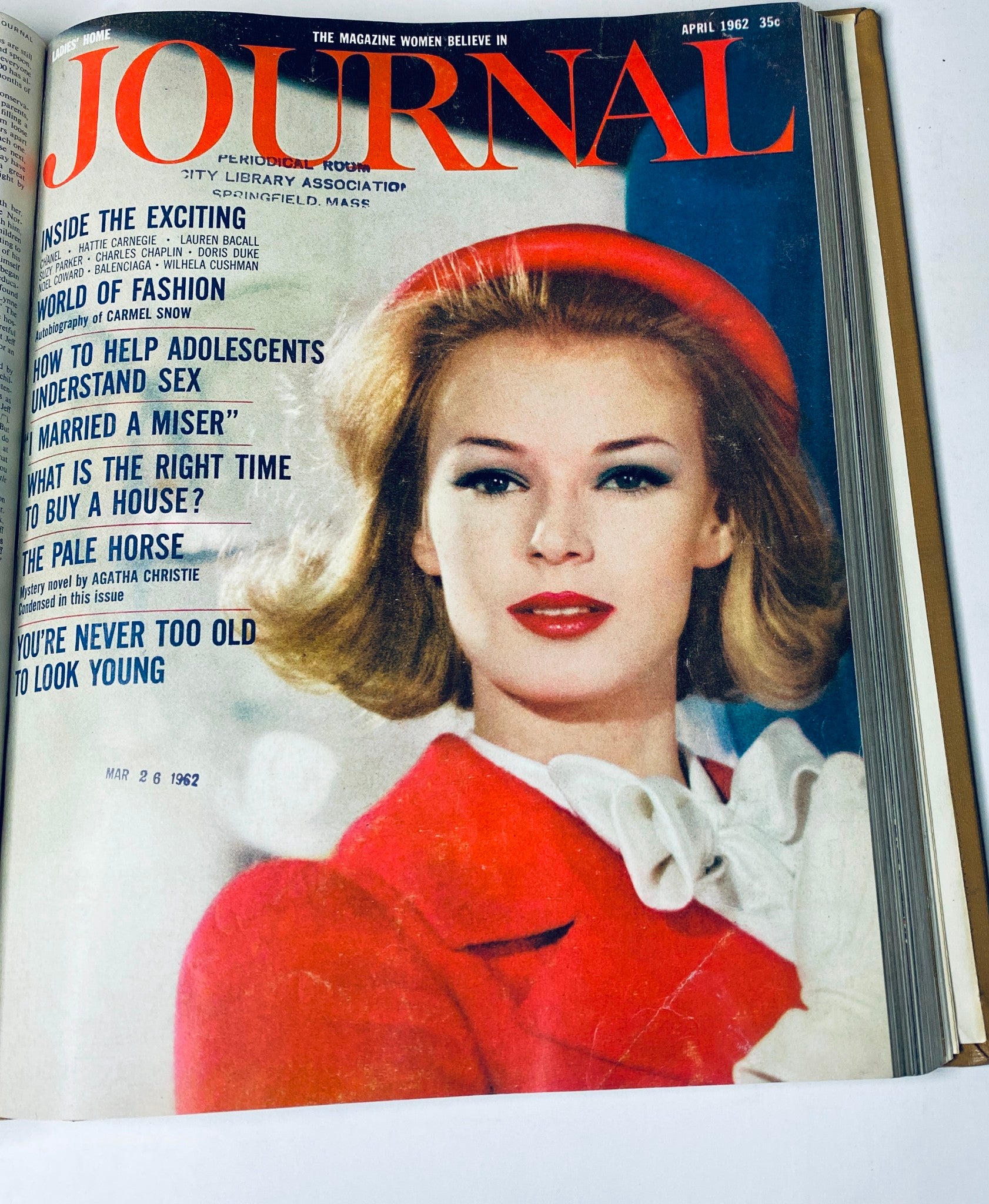 Ladies' Home Journal Library Bound Magazine 1962 Full Year January - December, featuring the April 1962 cover with a woman in a red outfit and hat, highlighting articles on fashion and advice.