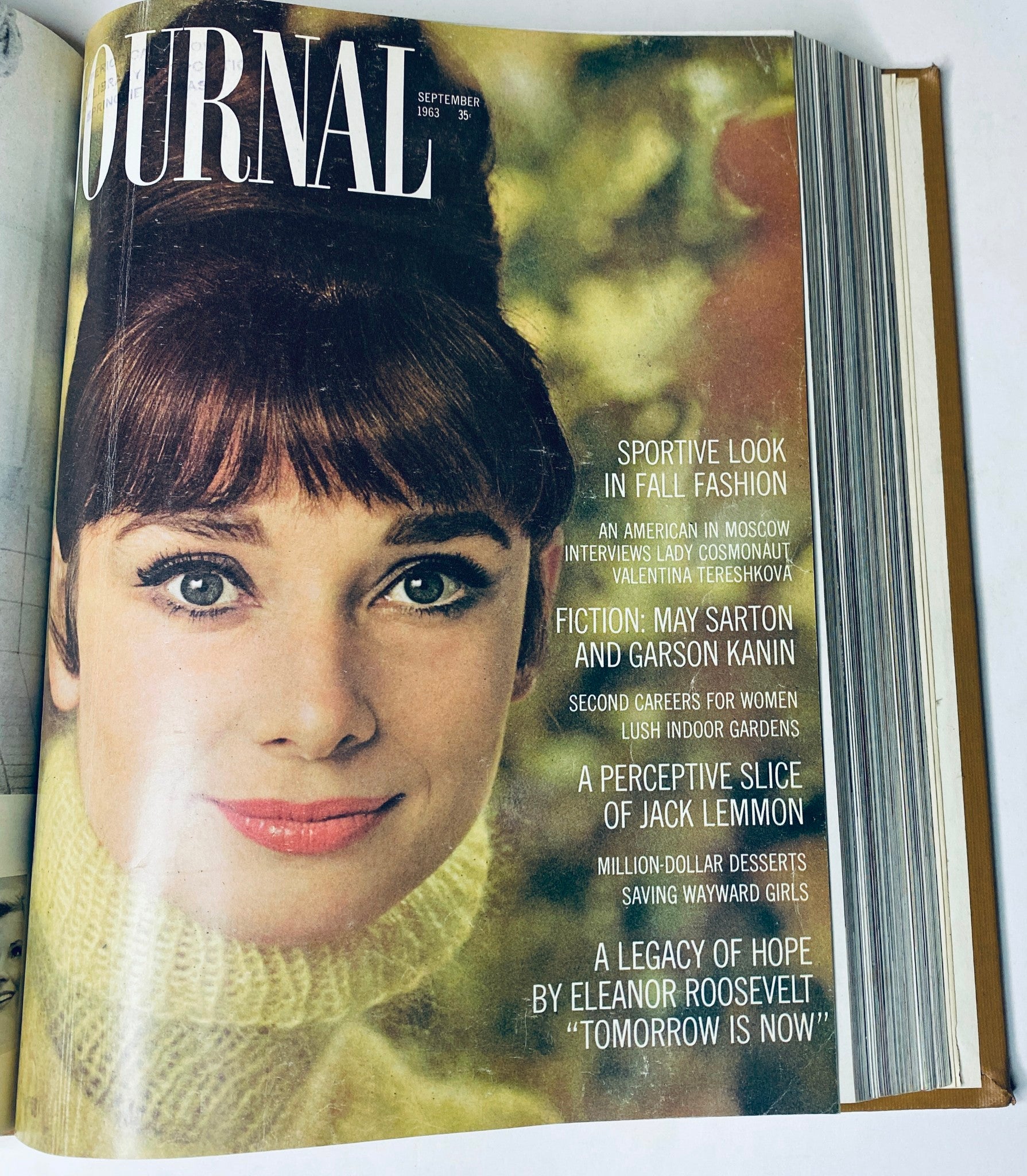 Ladies' Home Journal Library Bound Magazine 1963 Full Year January - December displaying a portrait of a model with a high Bun hairstyle in a cozy turtleneck on the cover of the September 1963 issue.