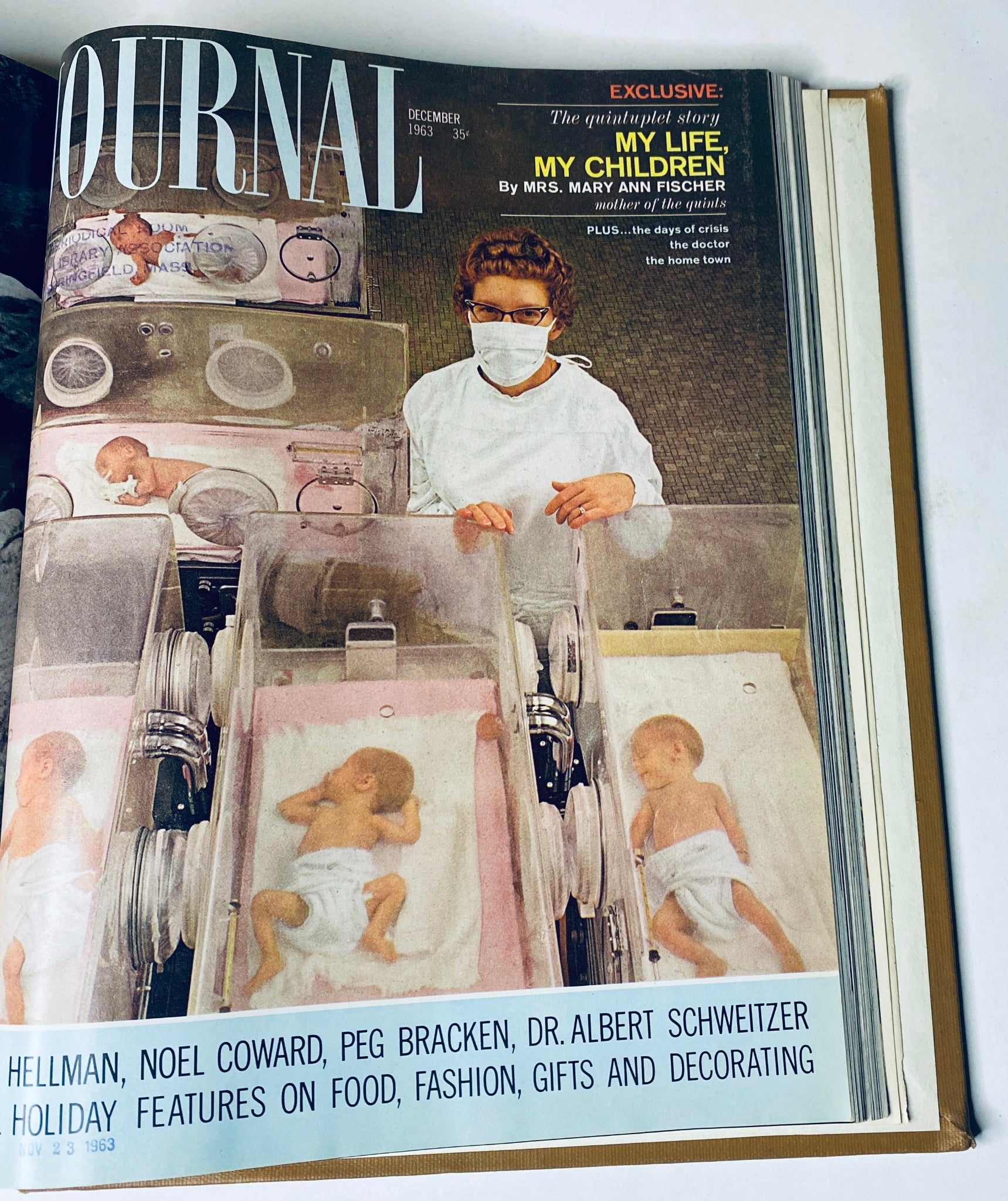 Ladies' Home Journal Library Bound Magazine 1963 Full Year January - December depicting a nurse holding multiple newborns in incubators on the cover of the December 1963 issue.