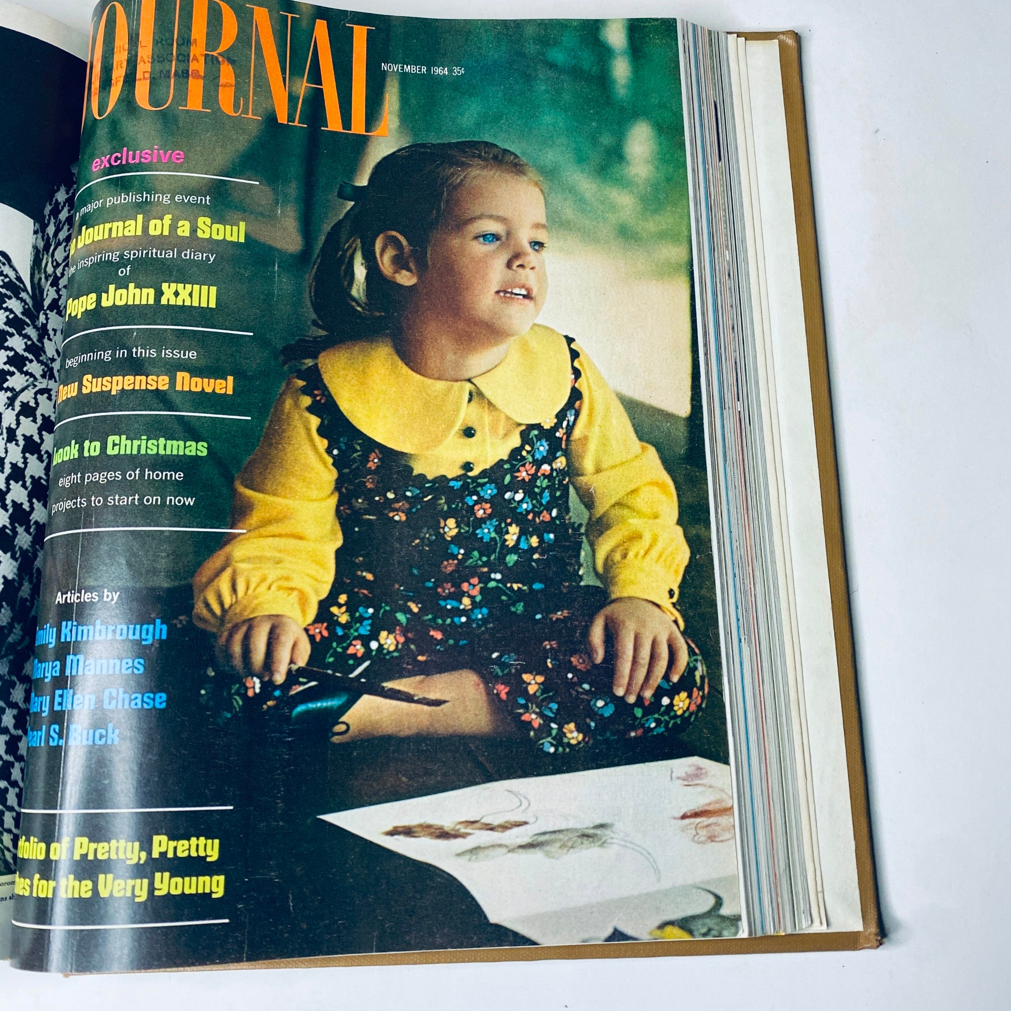 Ladies' Home Journal Bound Magazine 1964 - November issue cover featuring a young girl with scissors, focusing on home projects and children's activities during this period.