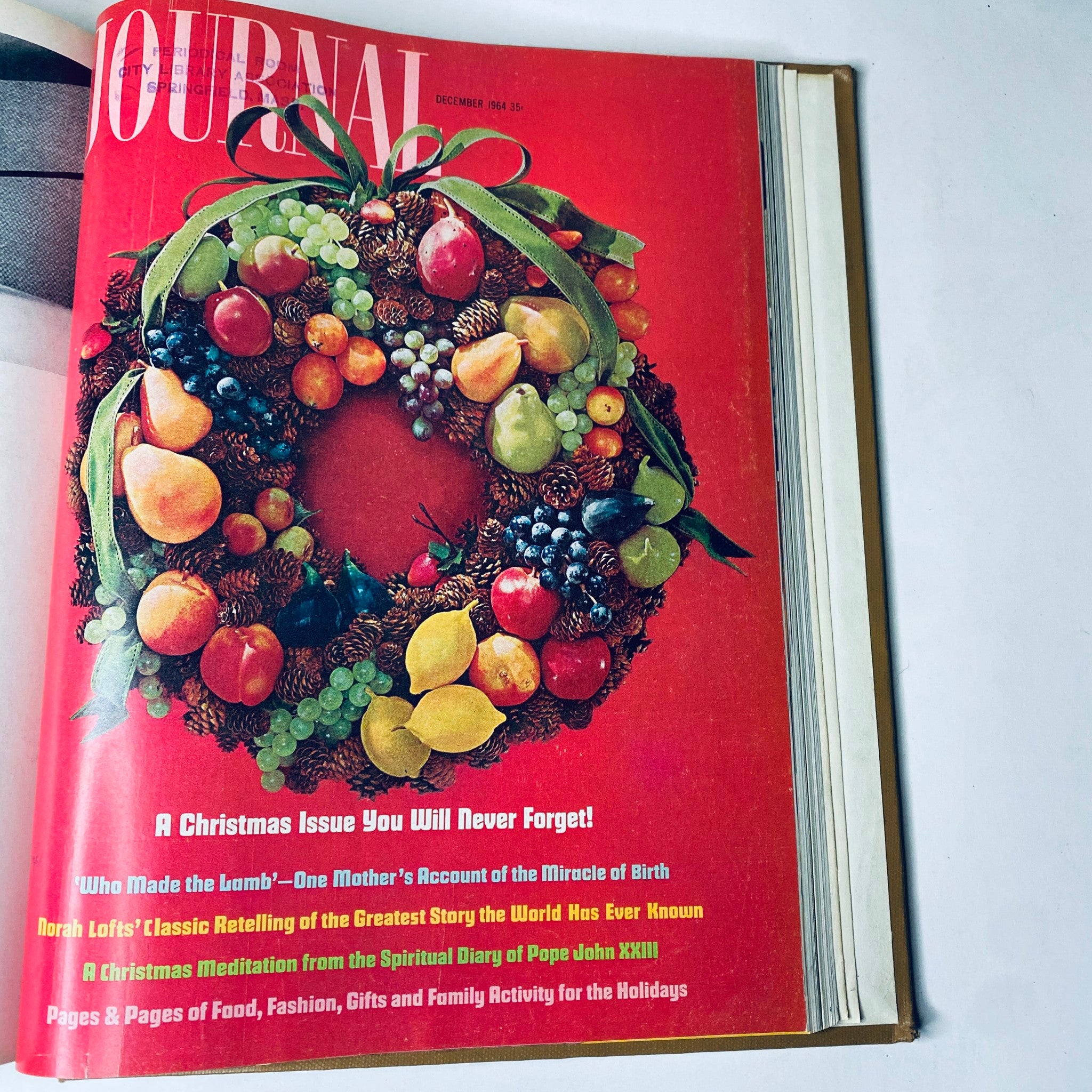 Ladies' Home Journal Bound Magazine 1964 - December issue cover showcasing a festive holiday wreath, emphasizing Christmas themes and seasonal topics.