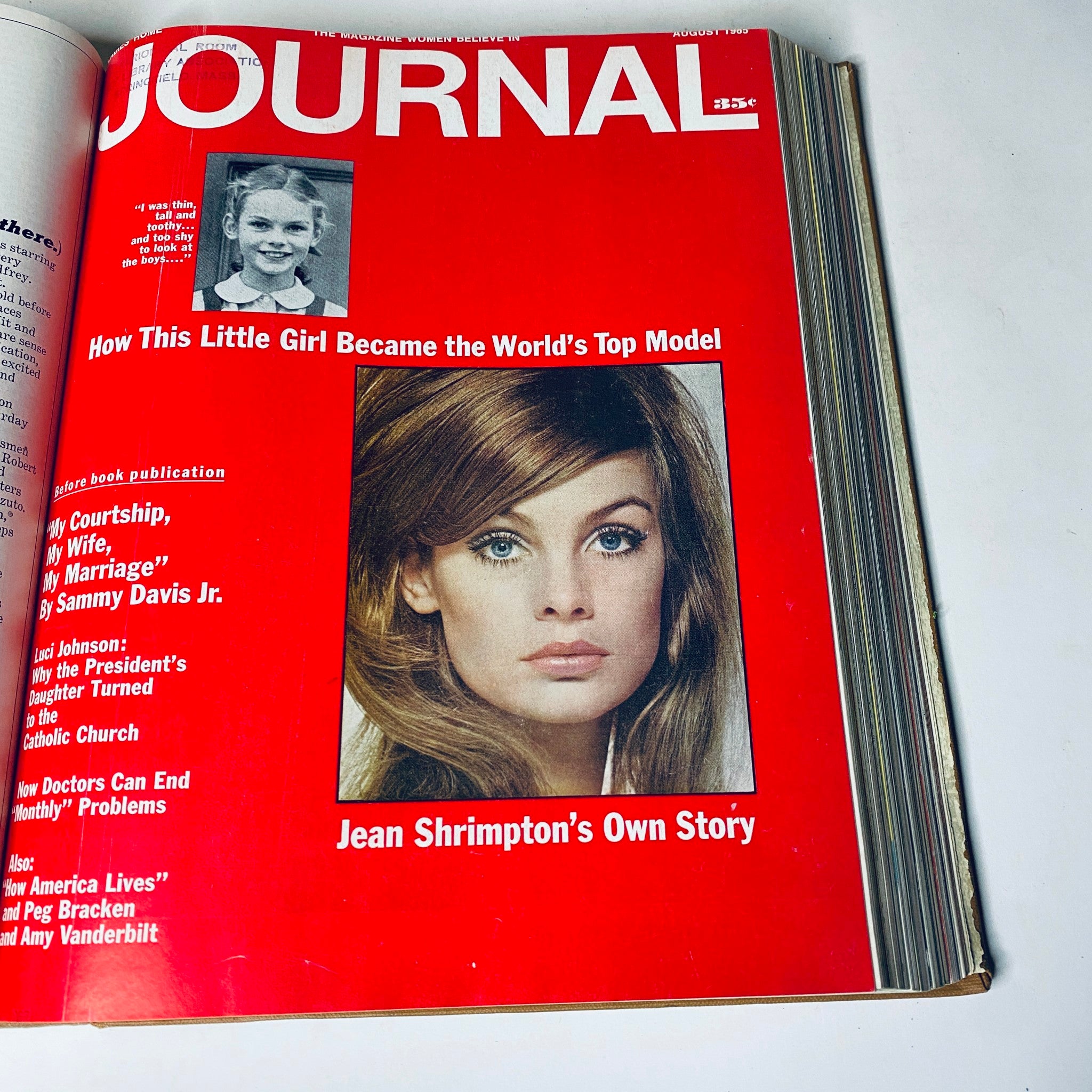 Cover of Ladies' Home Journal from August 1965 showcasing model Jean Shrimpton, with a bold red background and articles about her story and various cultural topics.