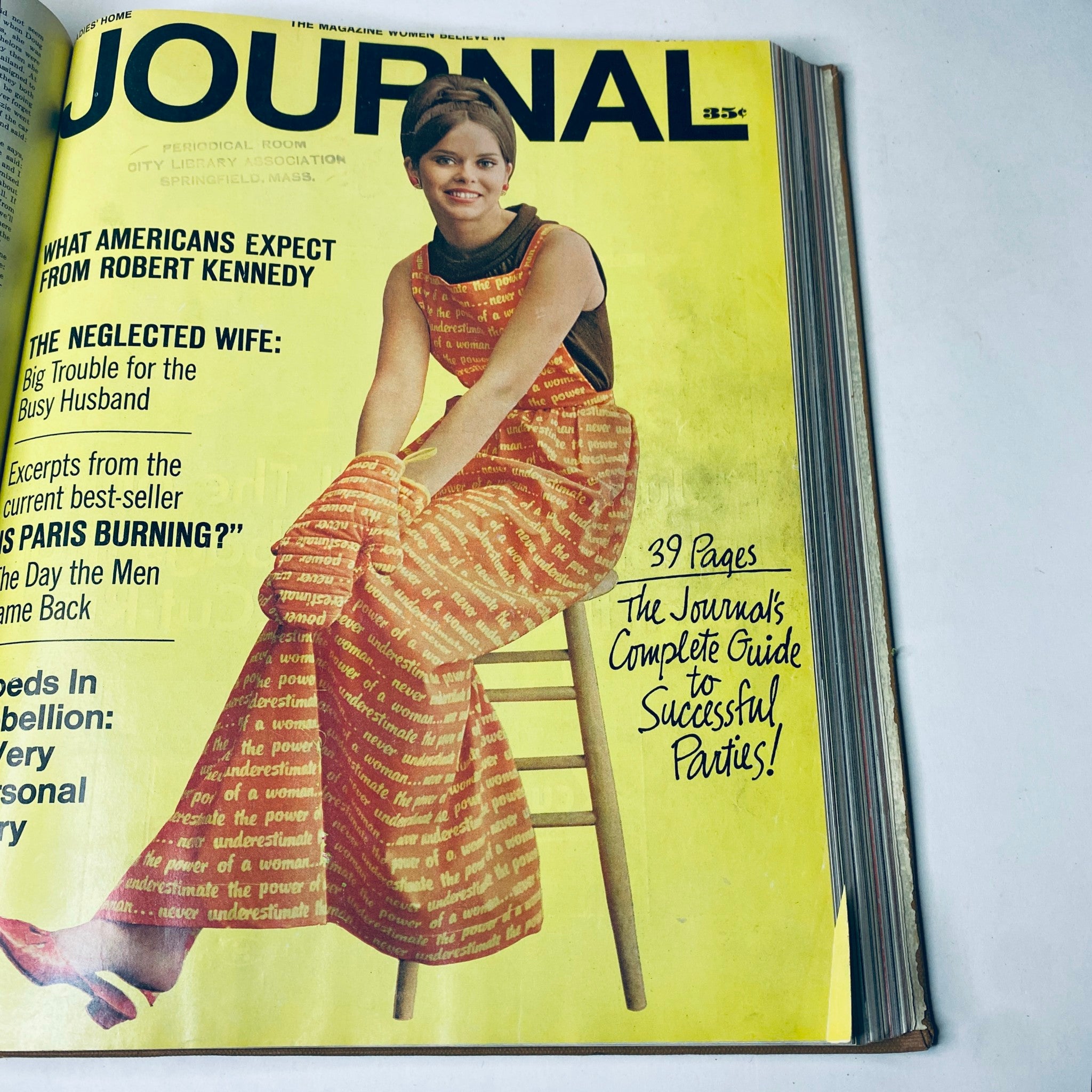 Cover of Ladies' Home Journal featuring a model in a colorful dress for the October 1965 issue, discussing various cultural topics and providing party planning tips.