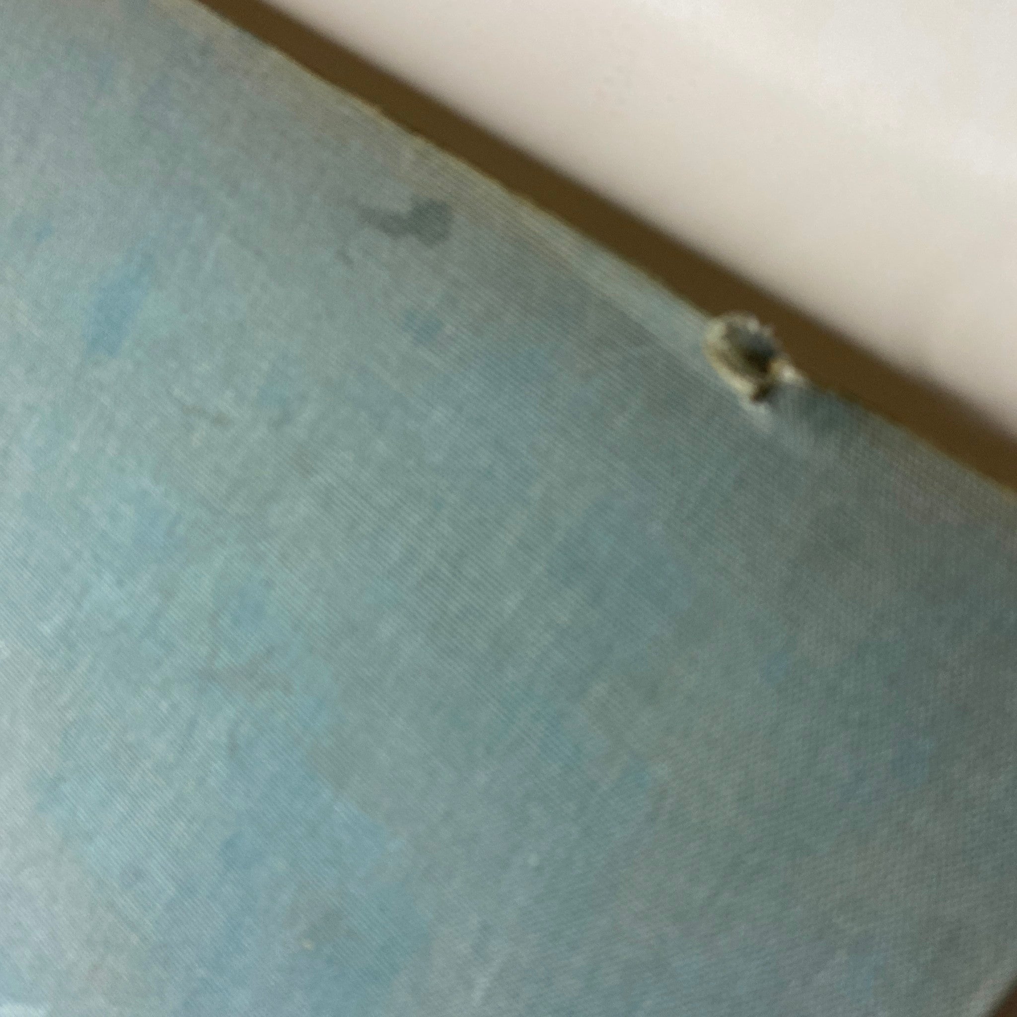 Close-up view of the cover of Ladies' Home Journal Library Bound Magazine 1942 - Full Year January to December, showing a small tear and fabric texture.