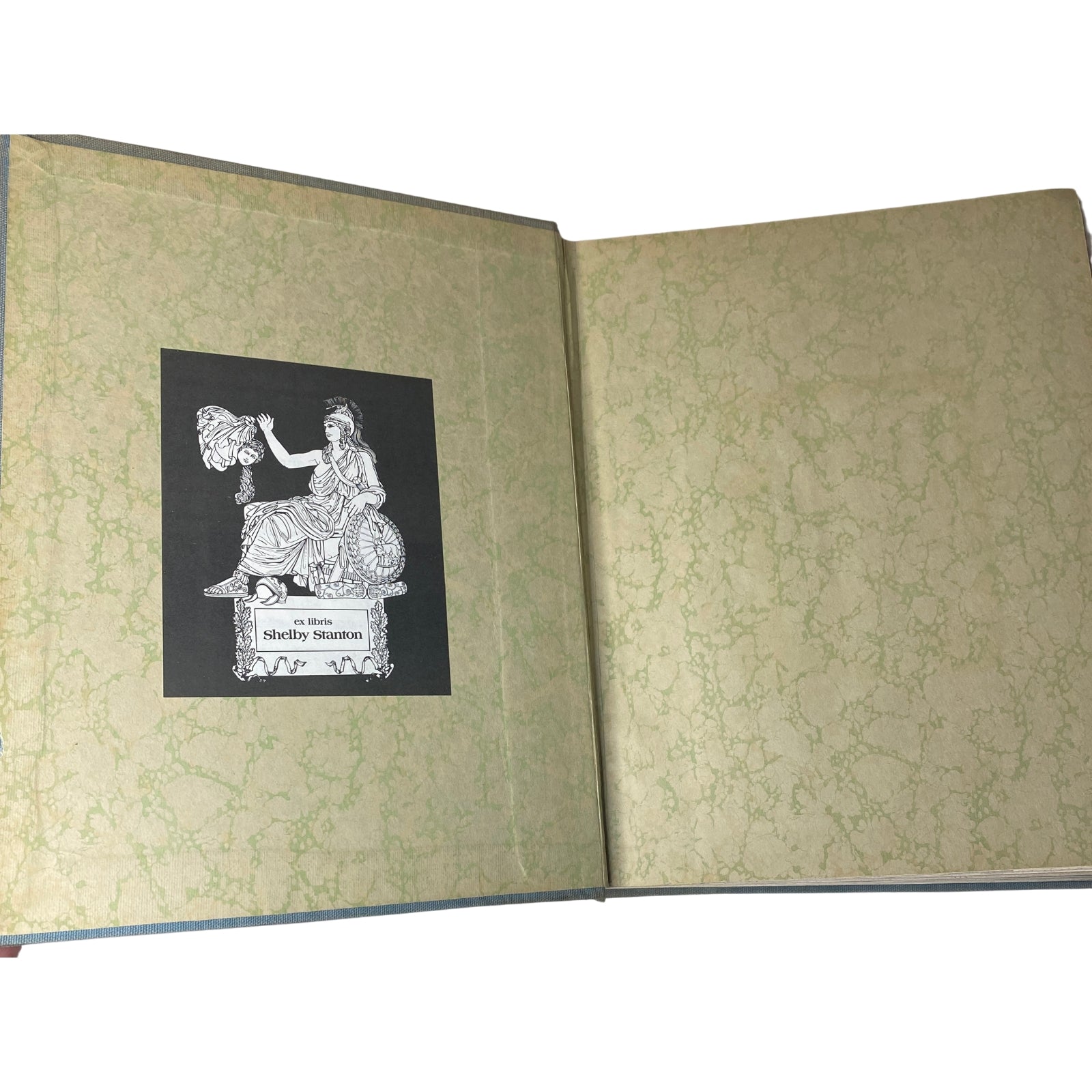 Inside view of Ladies' Home Journal Library Bound Magazine 1942 - Full Year January to December, showcasing the decorative endpaper with an ex libris label.